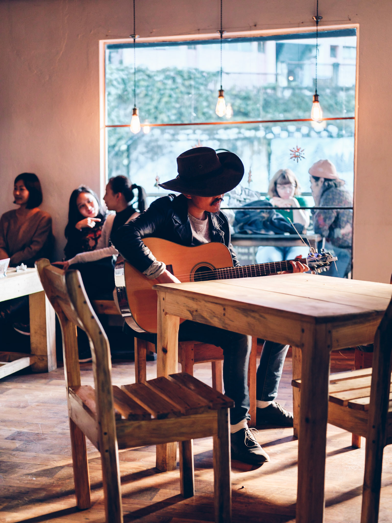 I was at Kohima's popular D Cafe when the distinctively attired George walked in. He sat at a table and played his guitar, singing along to the tunes playing on the cafe's music system. I thought he was an aspiring young musician. It turned out that he was actually an assistant professor of archology at a local university.