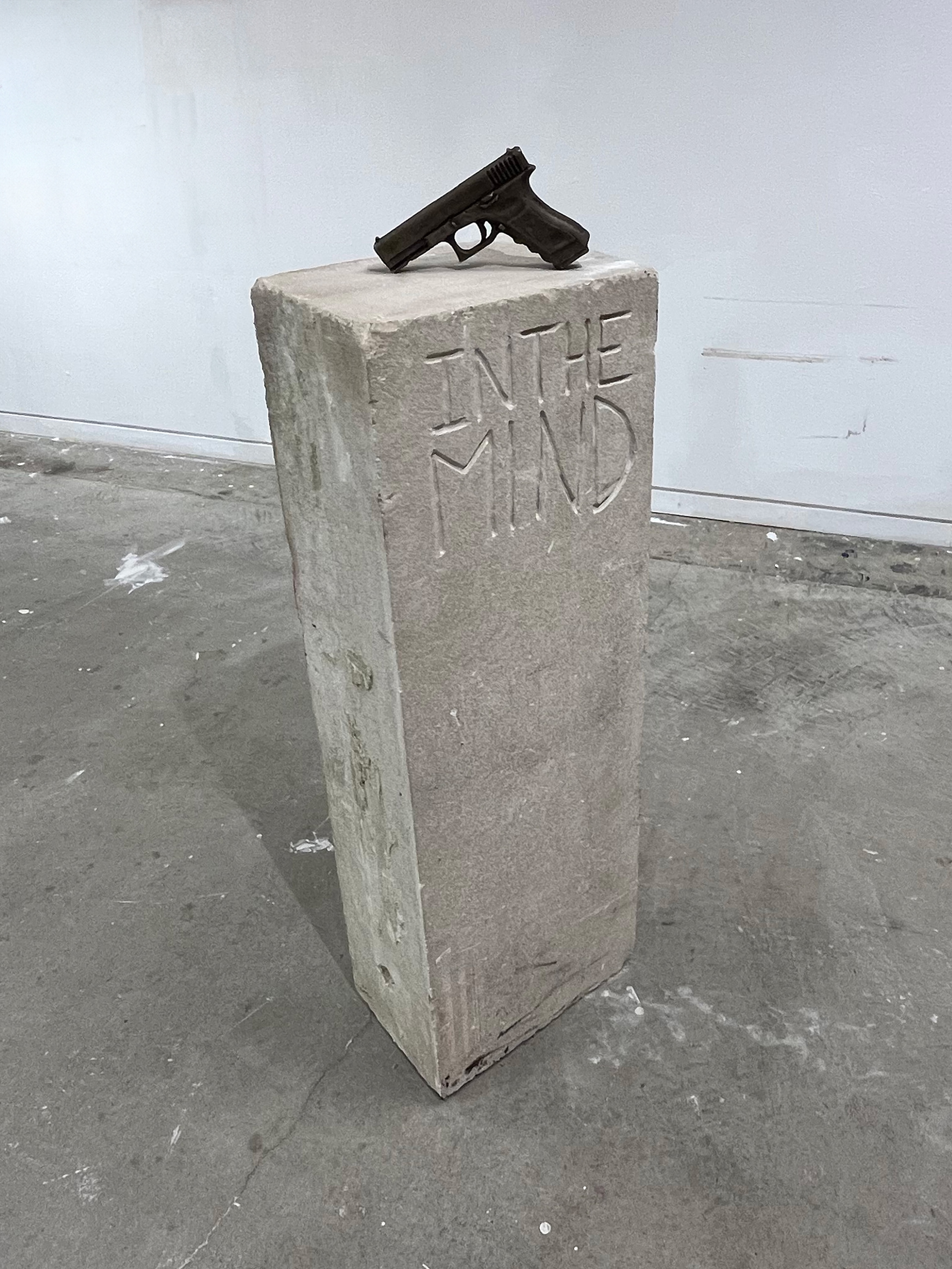 Shawn Sweeney, Paradoxe, 2025. Sculpture made from bronze, paper, and limestone architectural fragment from the Cincinnati Art Museum, 50x16x12 inches. Tribute to Jeanne d'Arc, cast at Casting Arts and Technology in Camp Washington, Cincinnati.