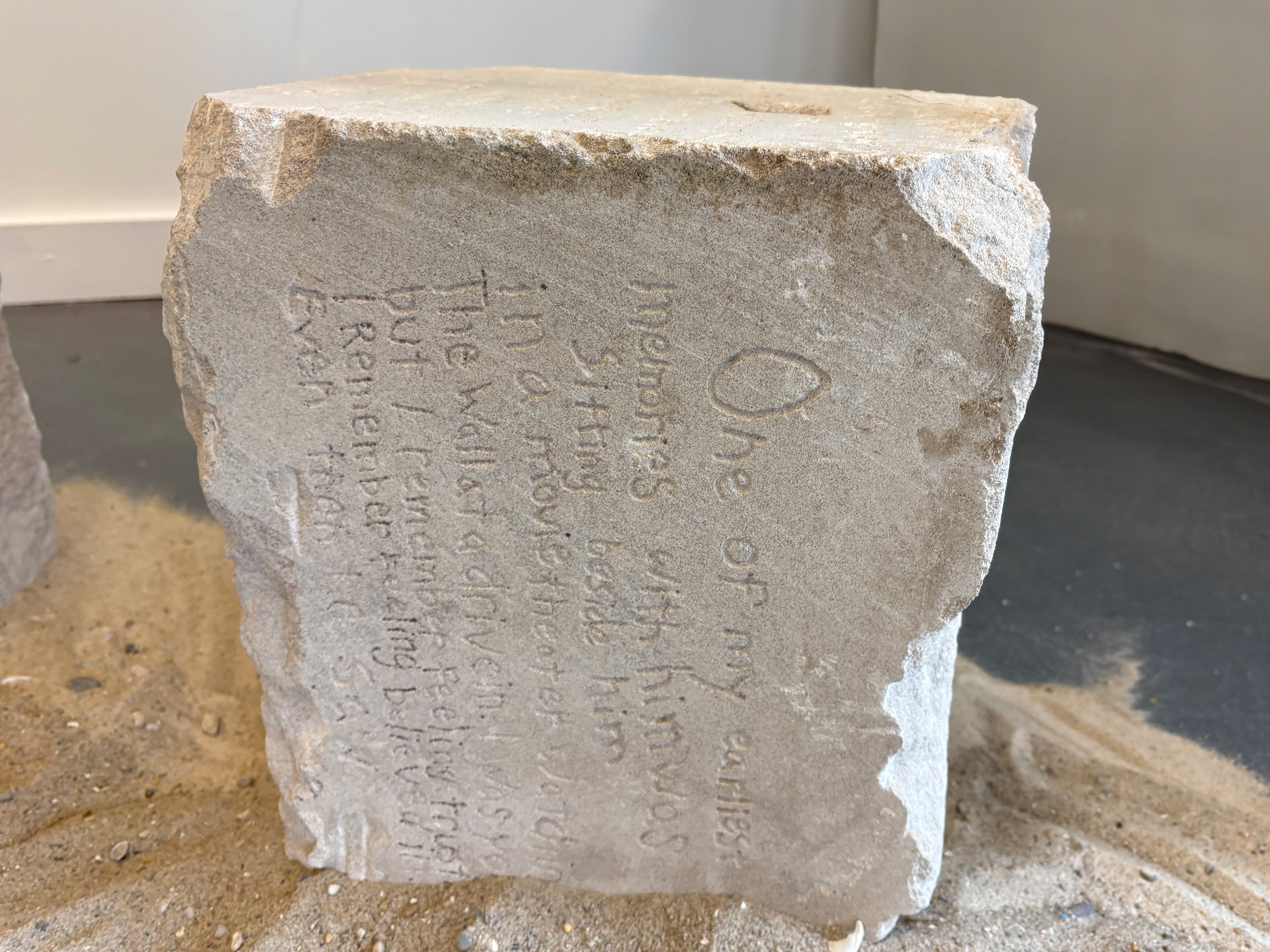 Shawn Sweeney, VIA, 2026. Large-scale sculpture using limestone architectural fragments from the Cincinnati Art Museum and sand from Rockaway Beach, 96x30x16 inches. Contemporary sculpture exploring grief, memory, and displacement.
