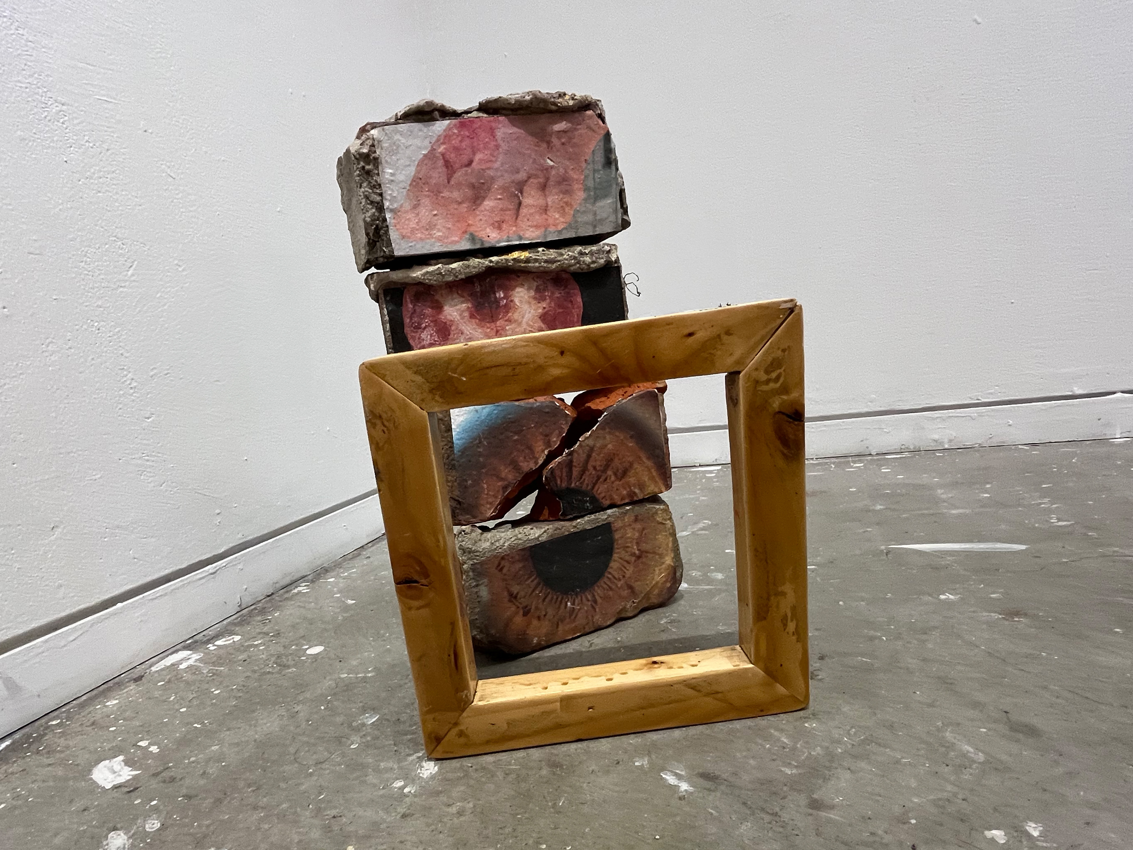 Shawn Sweeney, Pestilentia, 2025. Sculpture made from brick, paper, and wood, 15x8x8 inches. Contemporary mixed-media work using salvaged architectural materials.