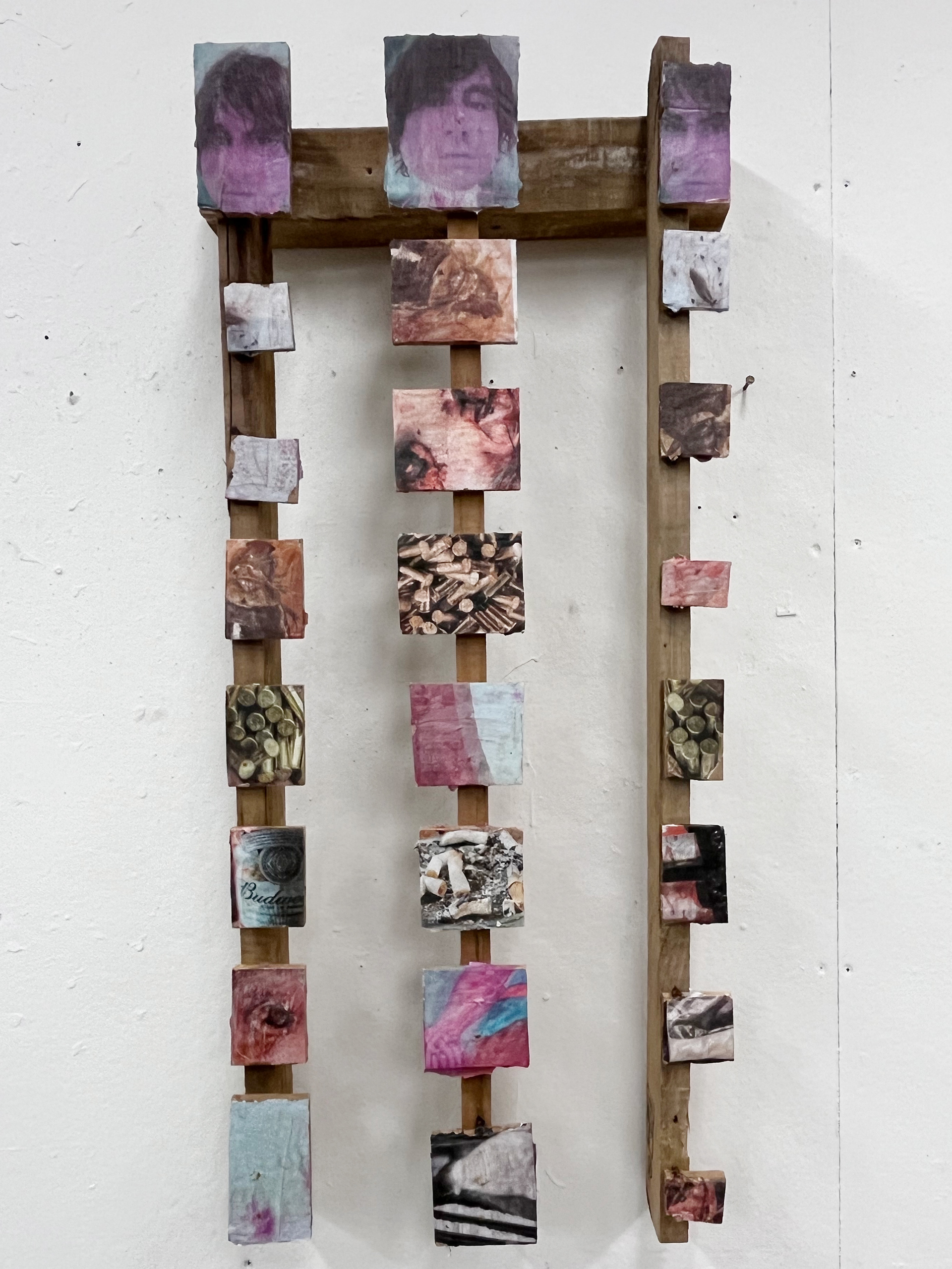 Shawn Sweeney, Golgotha, 2025. Wood and paper sculpture, 36x15x6 inches. Conceptual work inspired by Frida Kahlo's The Two Fridas (1939) and Cerberus, exploring duality and mortality.