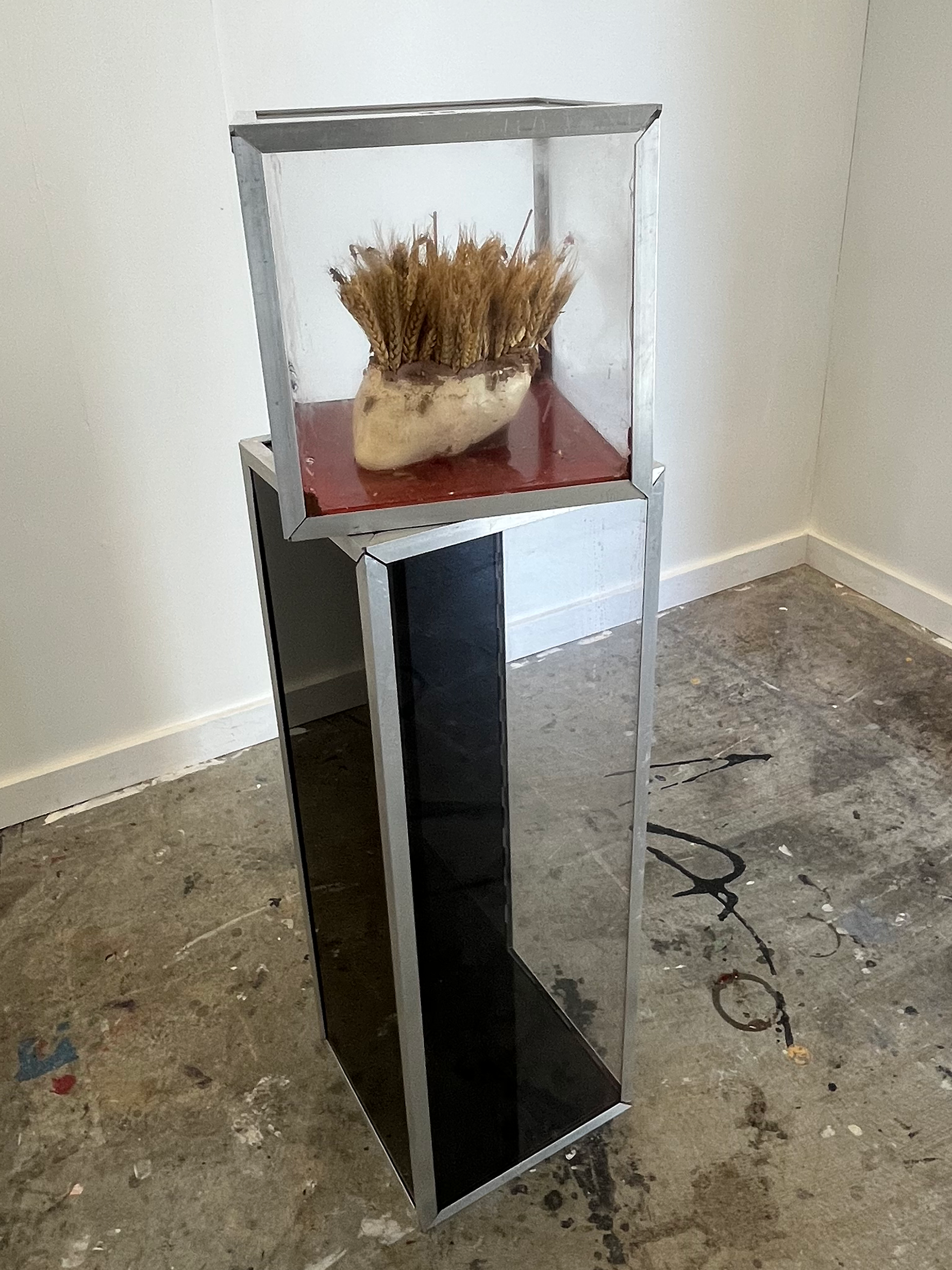 Shawn Sweeney, Babel, 2025. Vertical mixed-media sculpture, 48x12x12 inches, made from Red 40, Crisco, crickets, wheat, acrylic, aluminum, and PLA. Conceptual installation art using organic and synthetic materials.