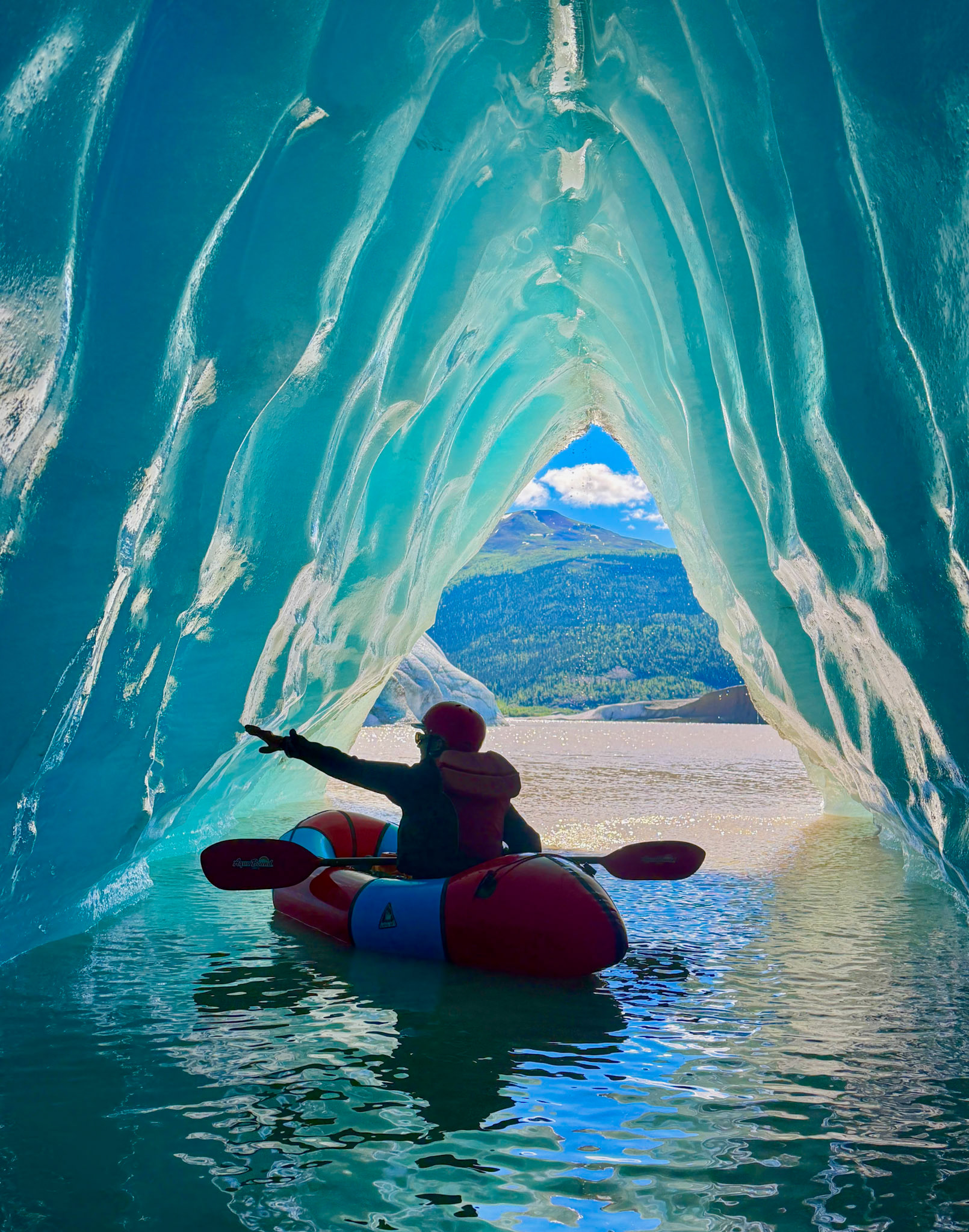 Pack rafting in ice cave, Doubful Lake, Wranglell - St. Elias National Park, AK