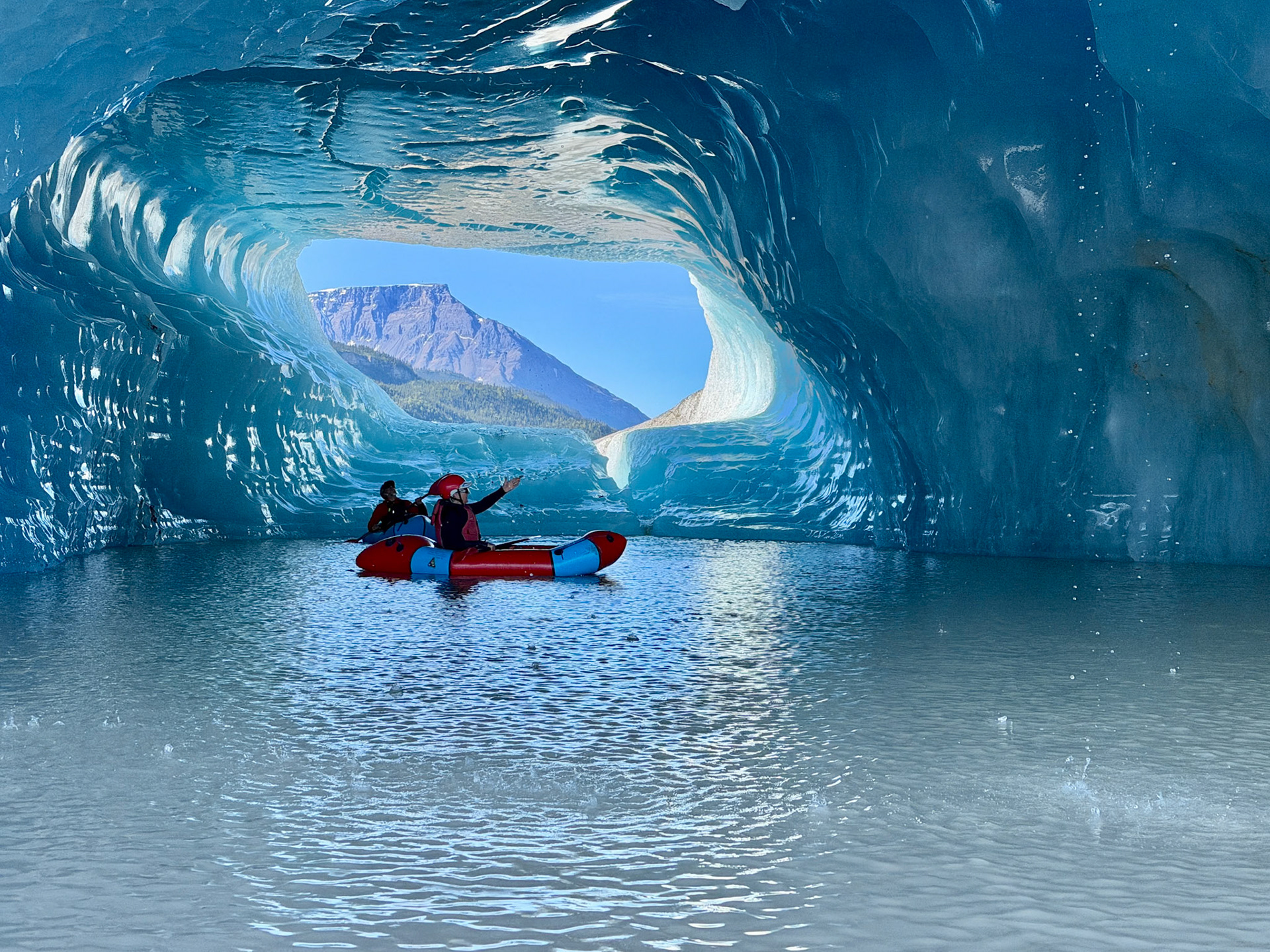 Pack rafting in ice cave, Doubful Lake, Wranglell - St. Elias National Park, AK