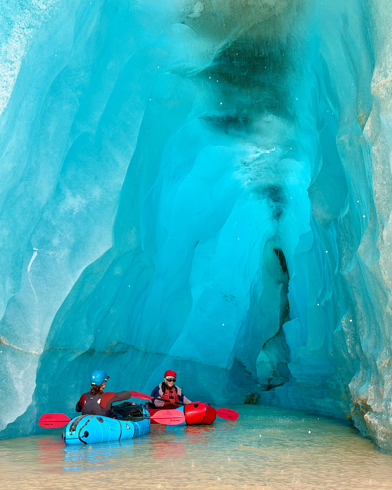 Pack rafting in ice cave, Doubful Lake, Wranglell - St. Elias National Park, AK