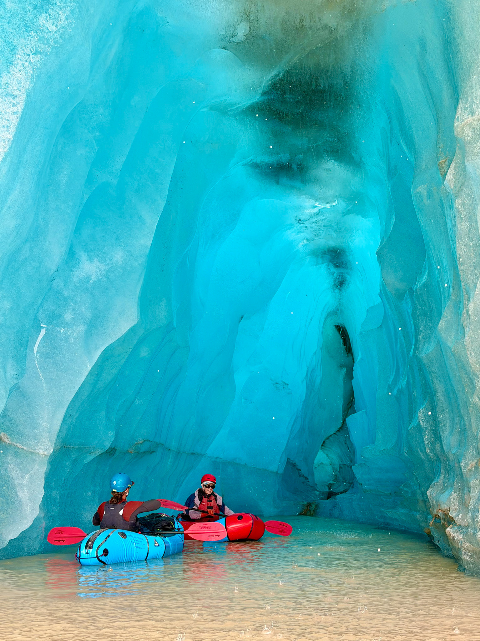 Pack rafting in ice cave, Doubful Lake, Wranglell - St. Elias National Park, AK