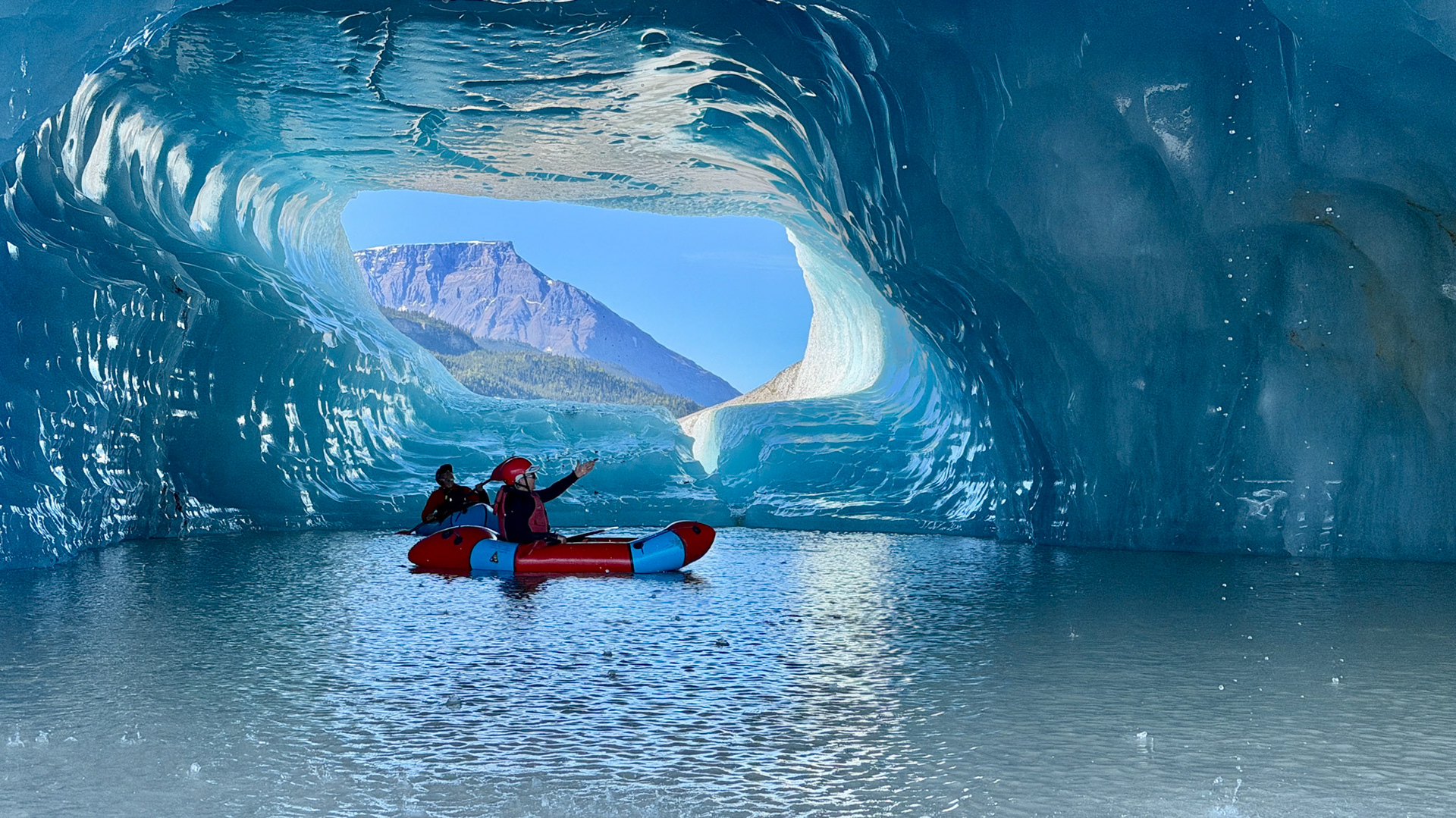 Pack rafting in ice cave, Doubful Lake, Wranglell - St. Elias National Park, AK