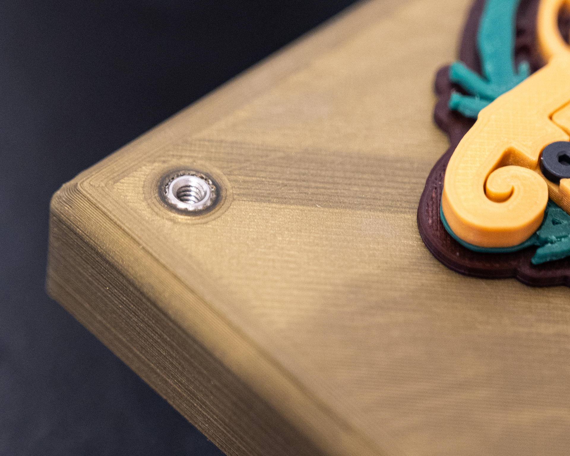 I hadn't used threaded heat set inserts before this project, but they were useful in places where it would be difficult to pass a bolt fully through the part.