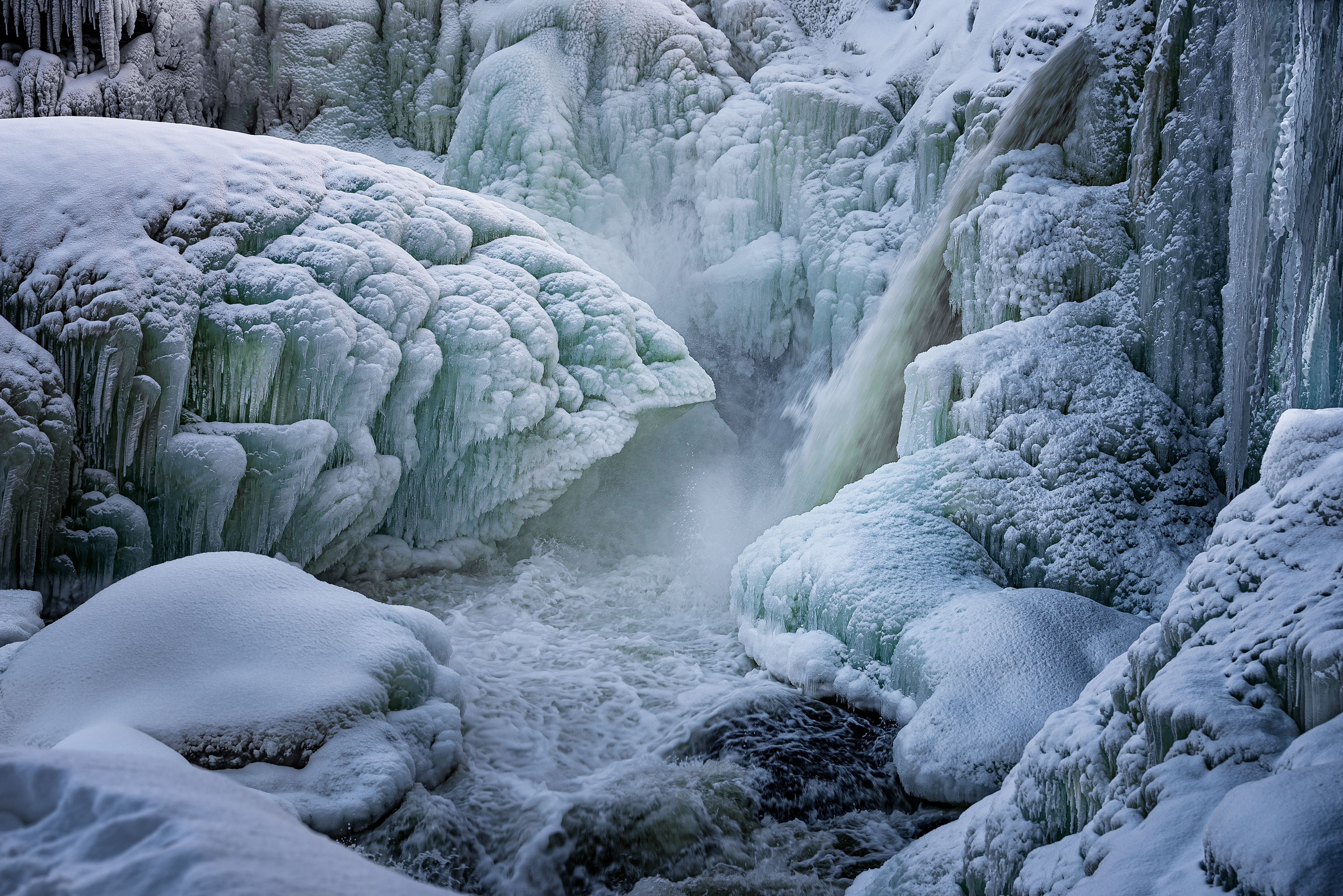 Ice and snow in Ristafallet waterfall
