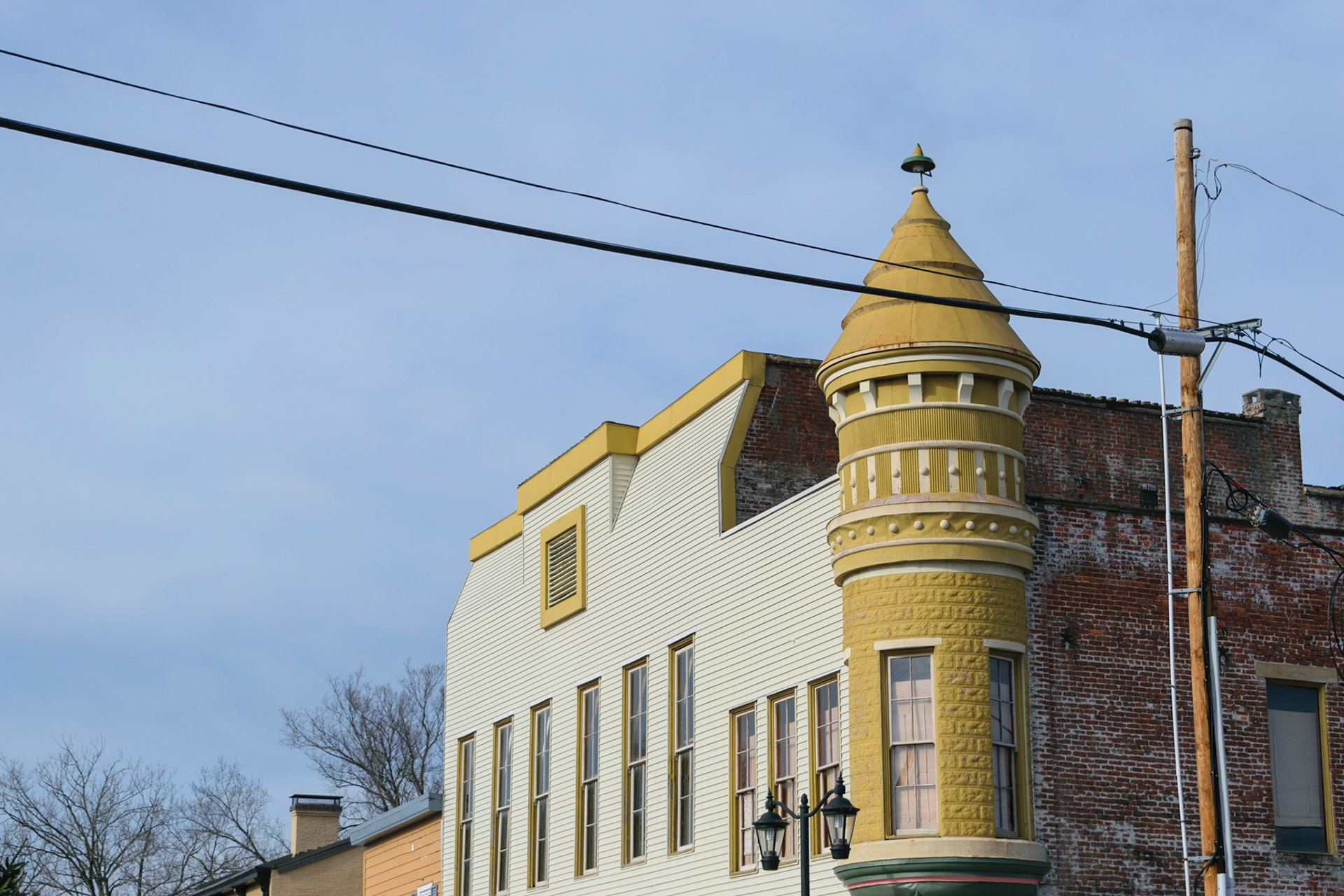 I noticed this odd yellow spire poking out from the top of the skyline.