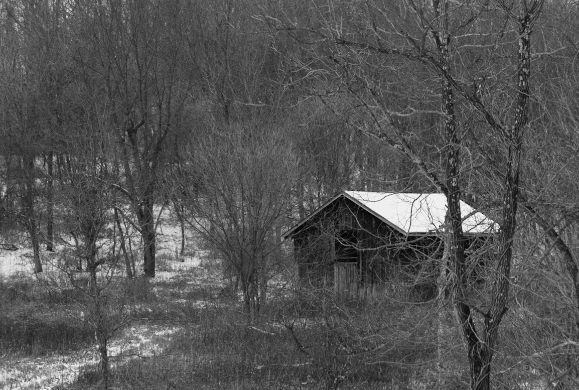 I saw this old barn out in the distance. Even though I don't have a long zoom lens, after some cropping I think the picture came out well.
