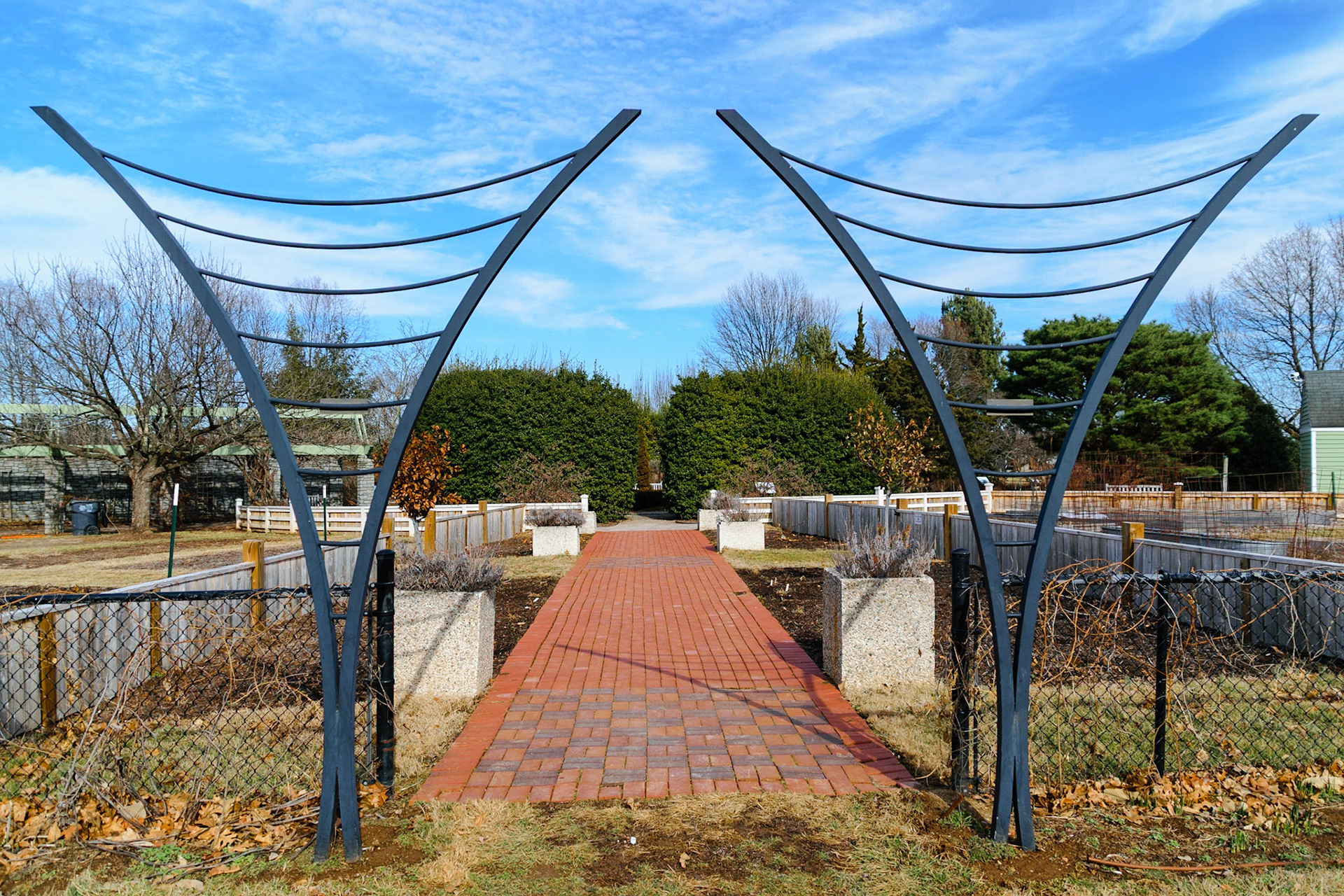 These statues sit at one of the entrances to the household garden exhibits.