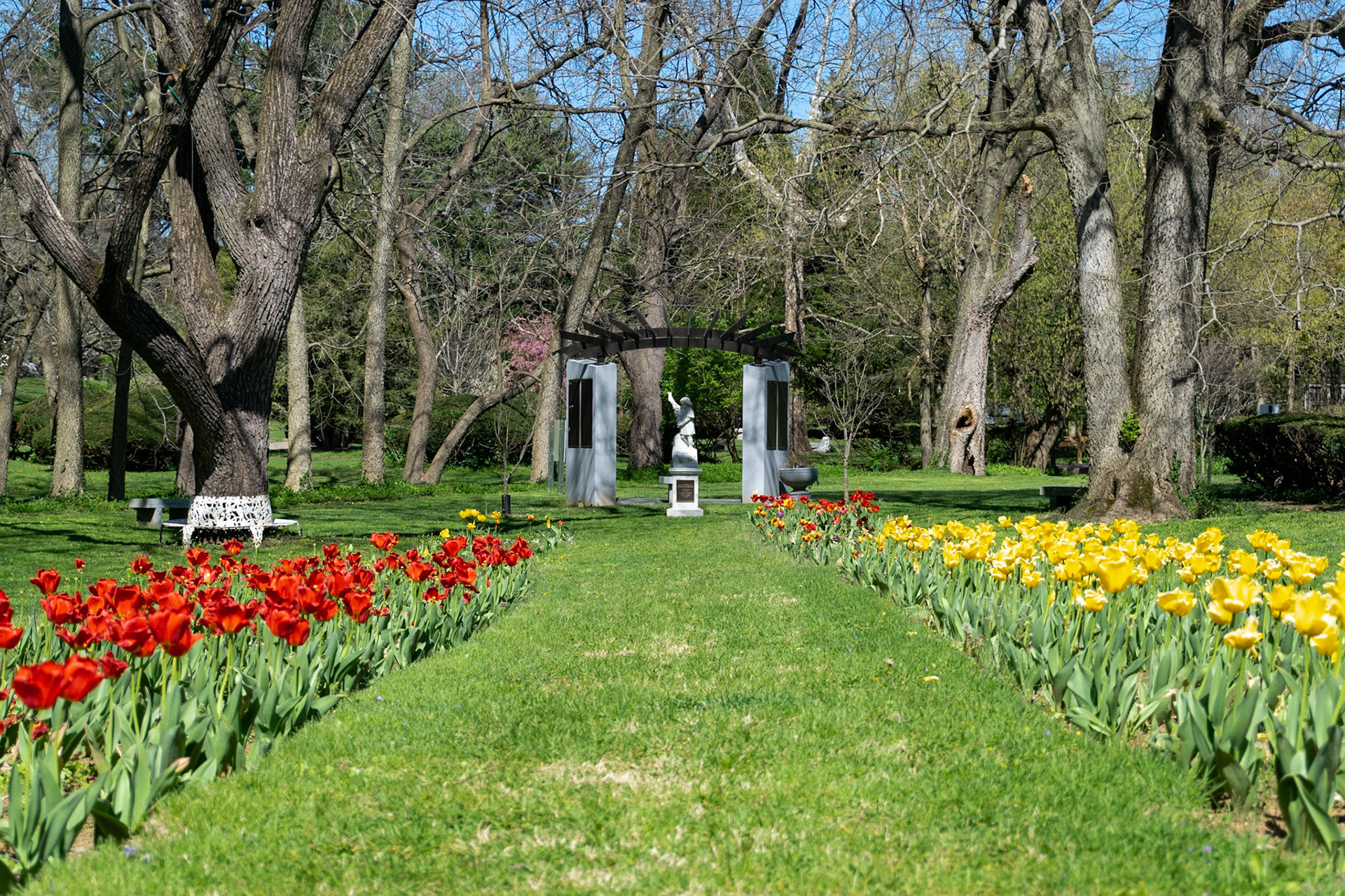This small path marked with flowers enhances the beauty of the cemetary.