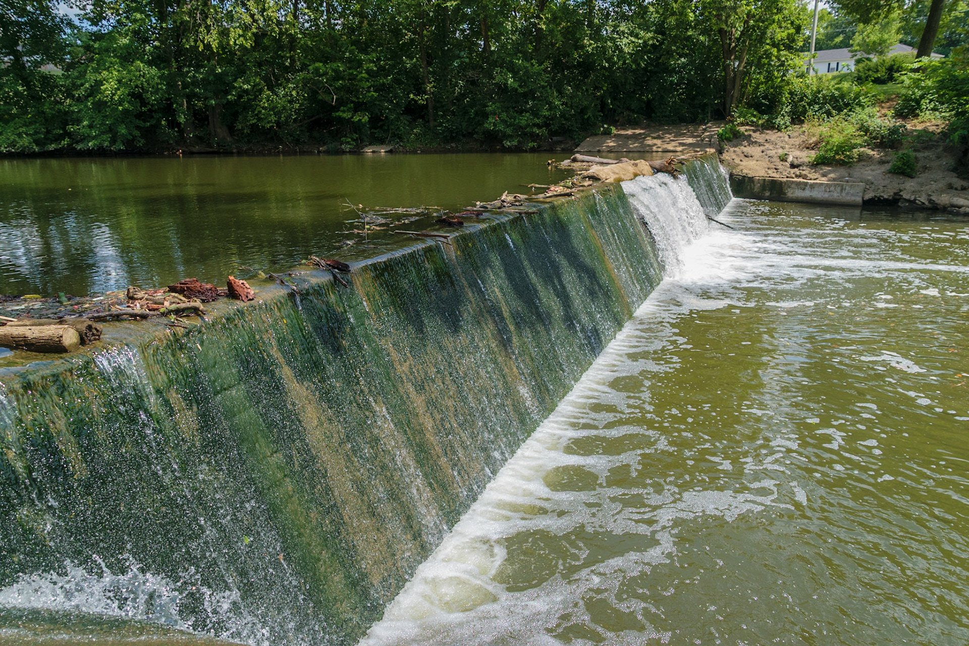 Water from the Elkhorn washes over the dam near the garden.
