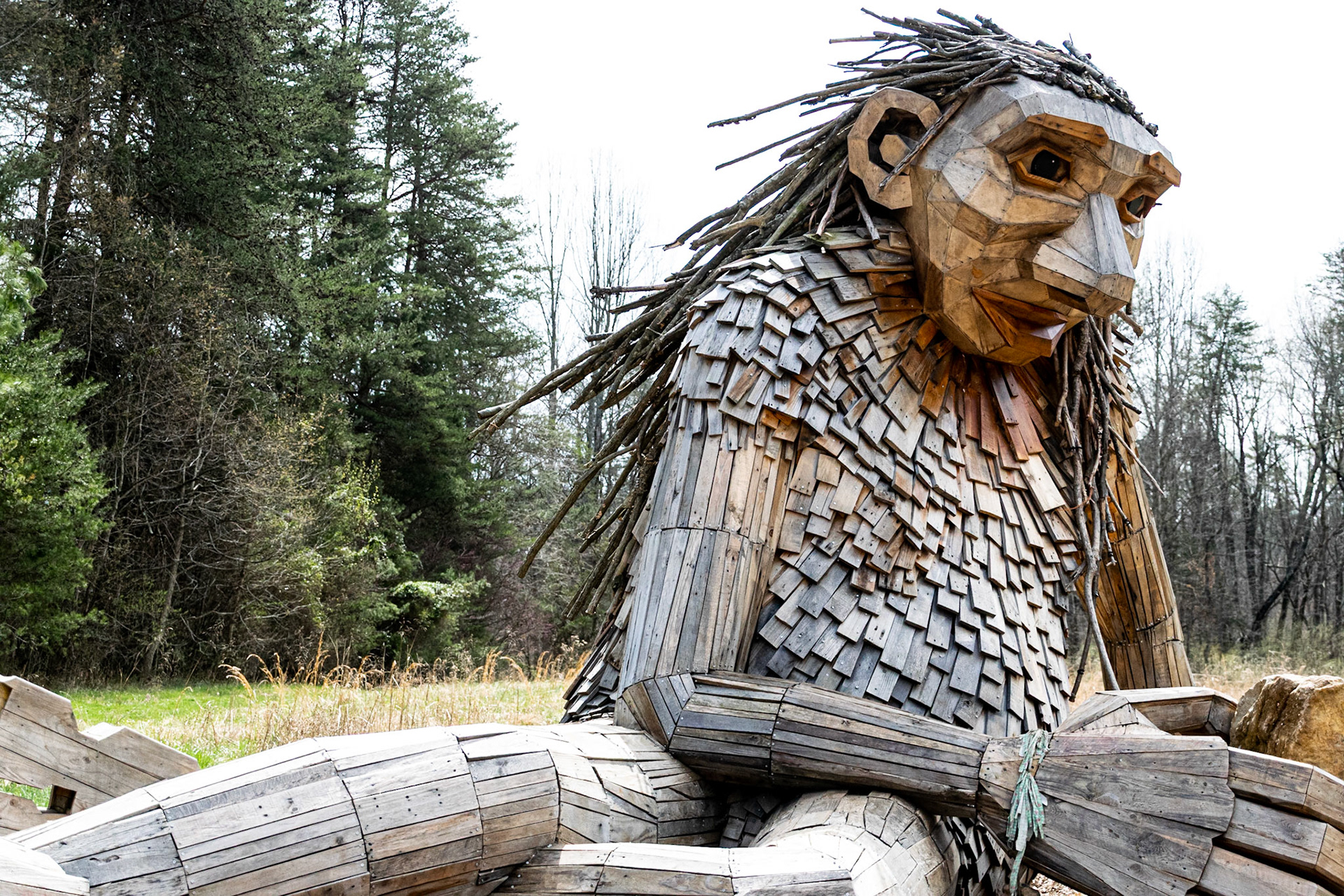 Little Elina was playing with some rocks and was resting after working hard moving these huge stones.