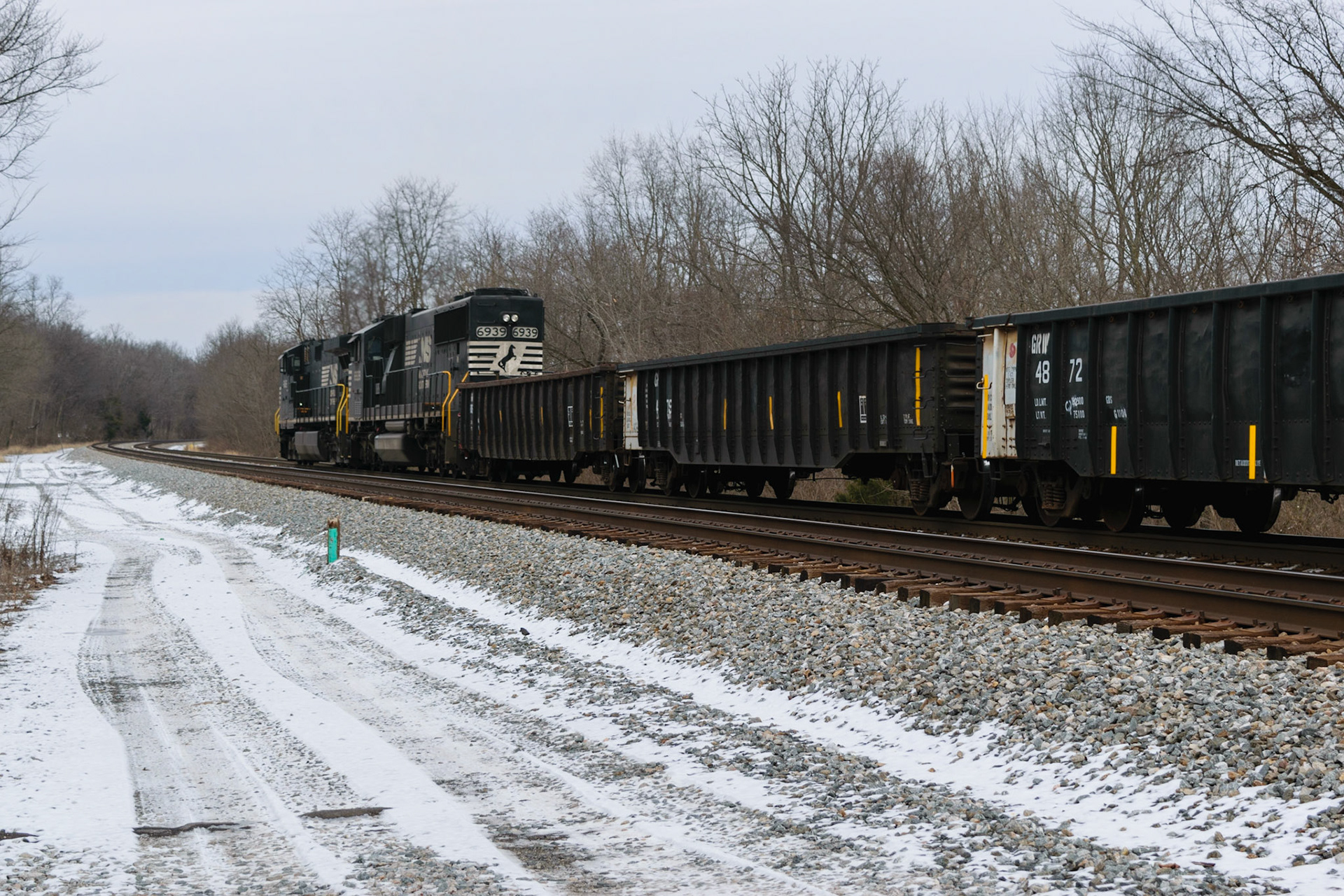 A shot of the train as it was slowly pulling away. It actually pulled up, then reversed. I think it was parking in a train yard just down the tracks.