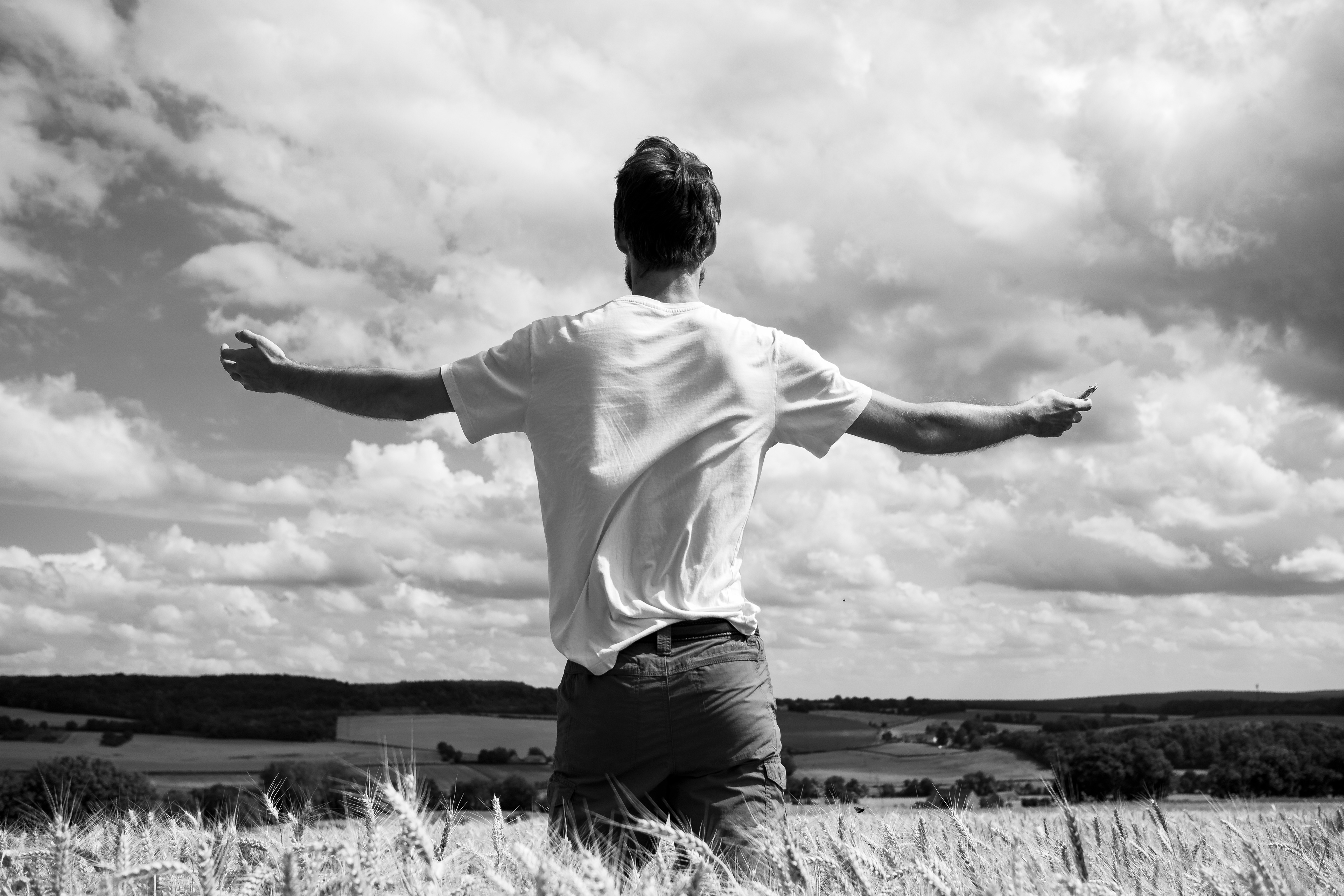 Man saluting god in the fields