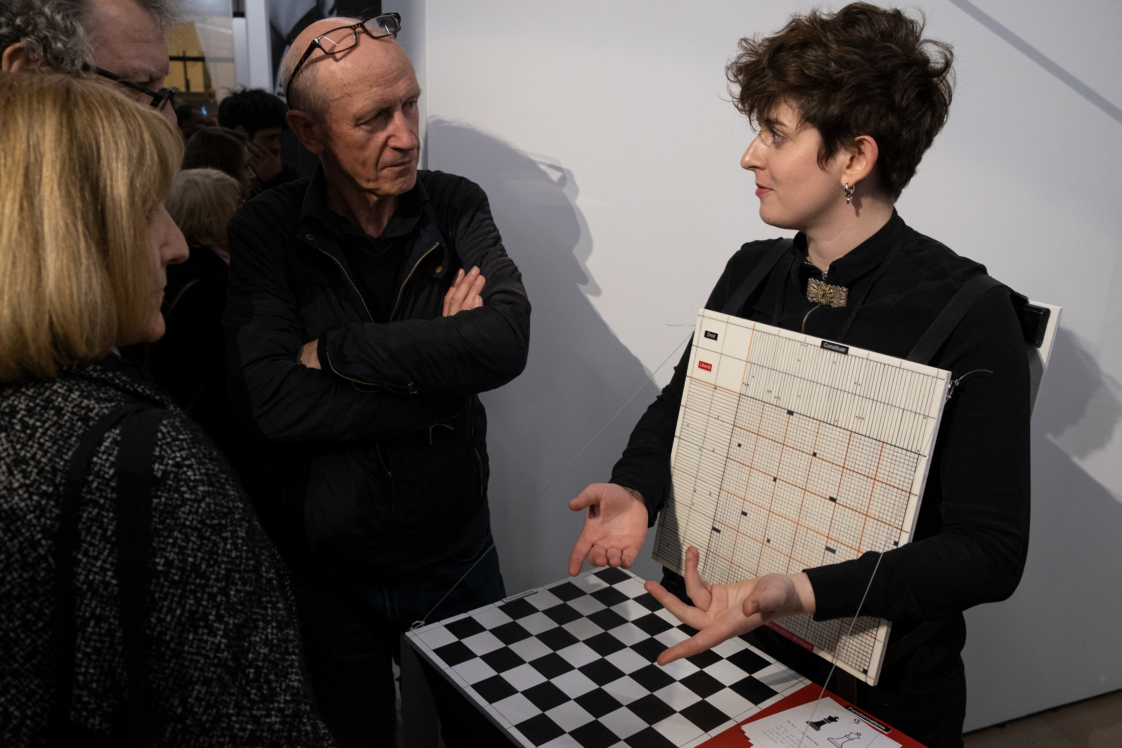 Camille Sauer presents her work Costume de Société during the opening of the 64th Salon de Montrouge