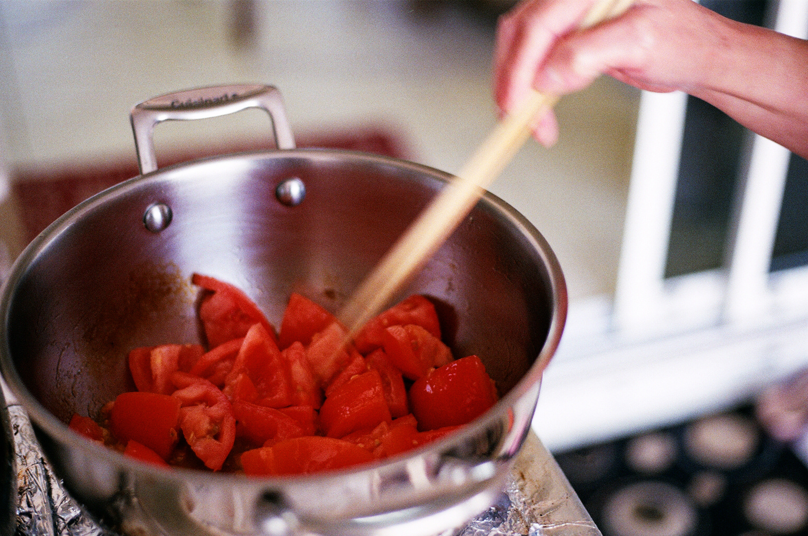 Sautéing tomatoes.