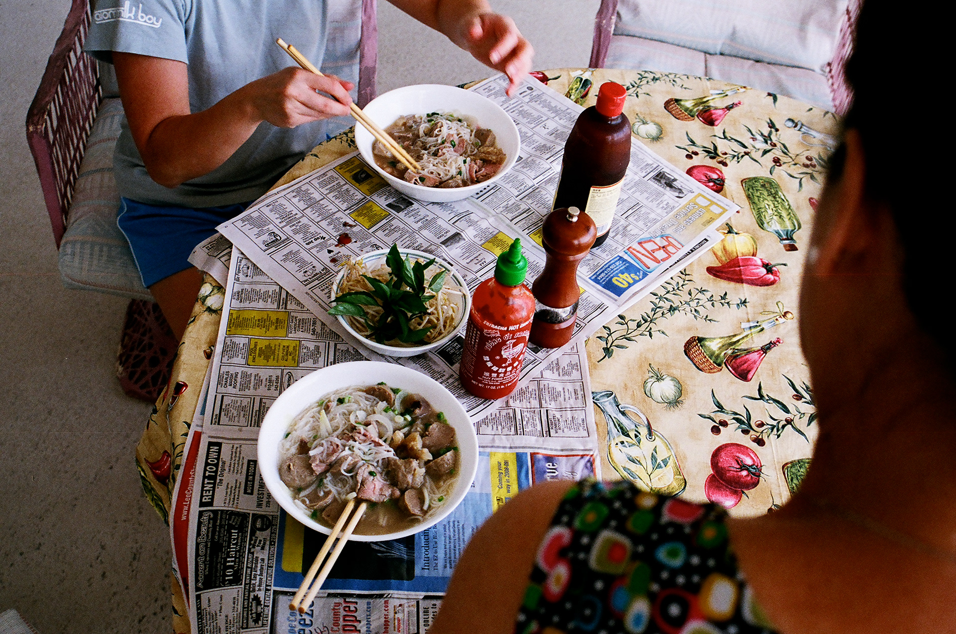 In classic Vietnamese fashion, newspaper makes the best placemats.