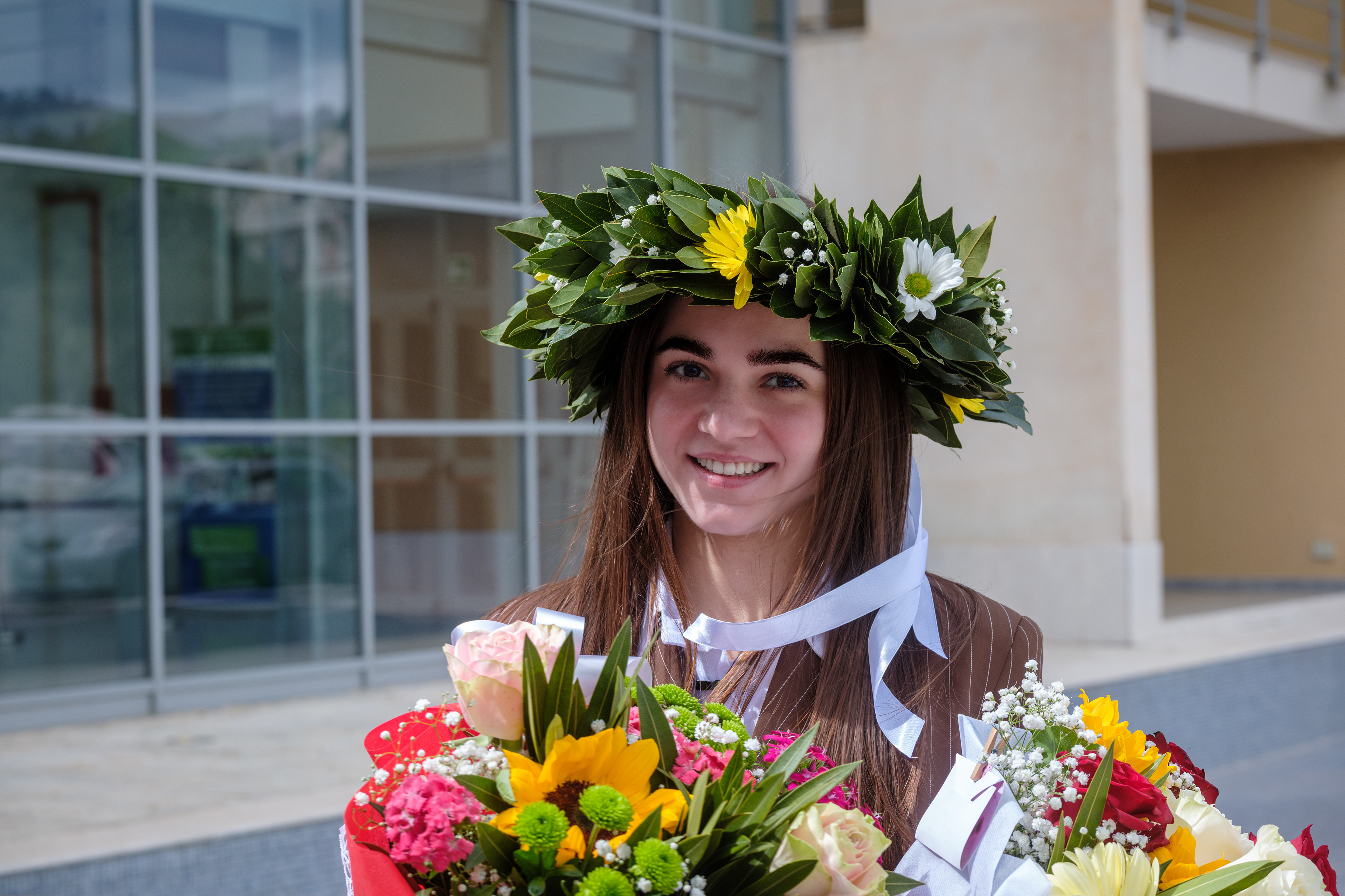 Servizio fotografico laurea a Enna con bouquet colorato – ABA Foto Video