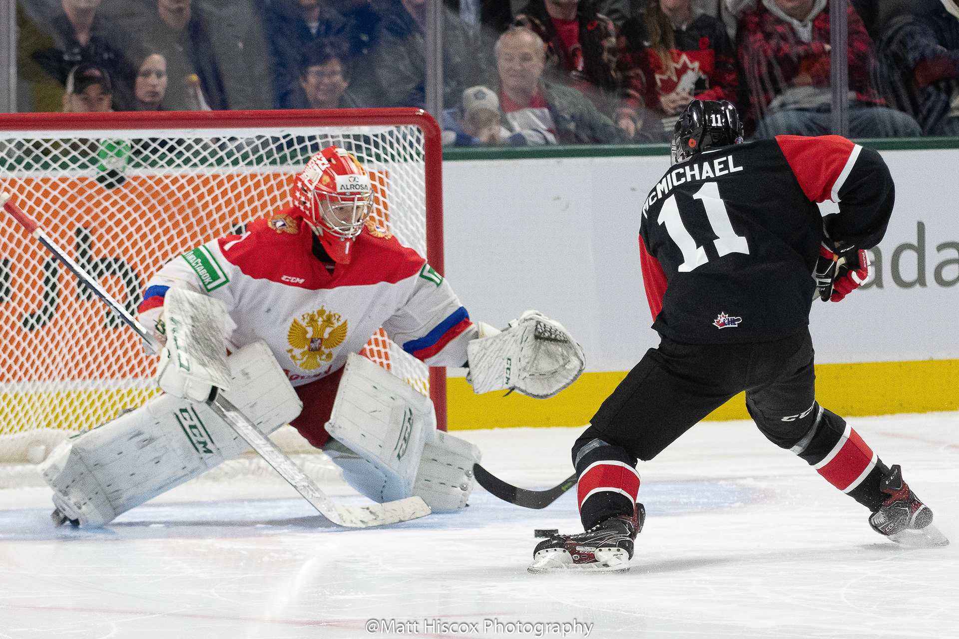 Connor McMichael on Amir Miftakhov