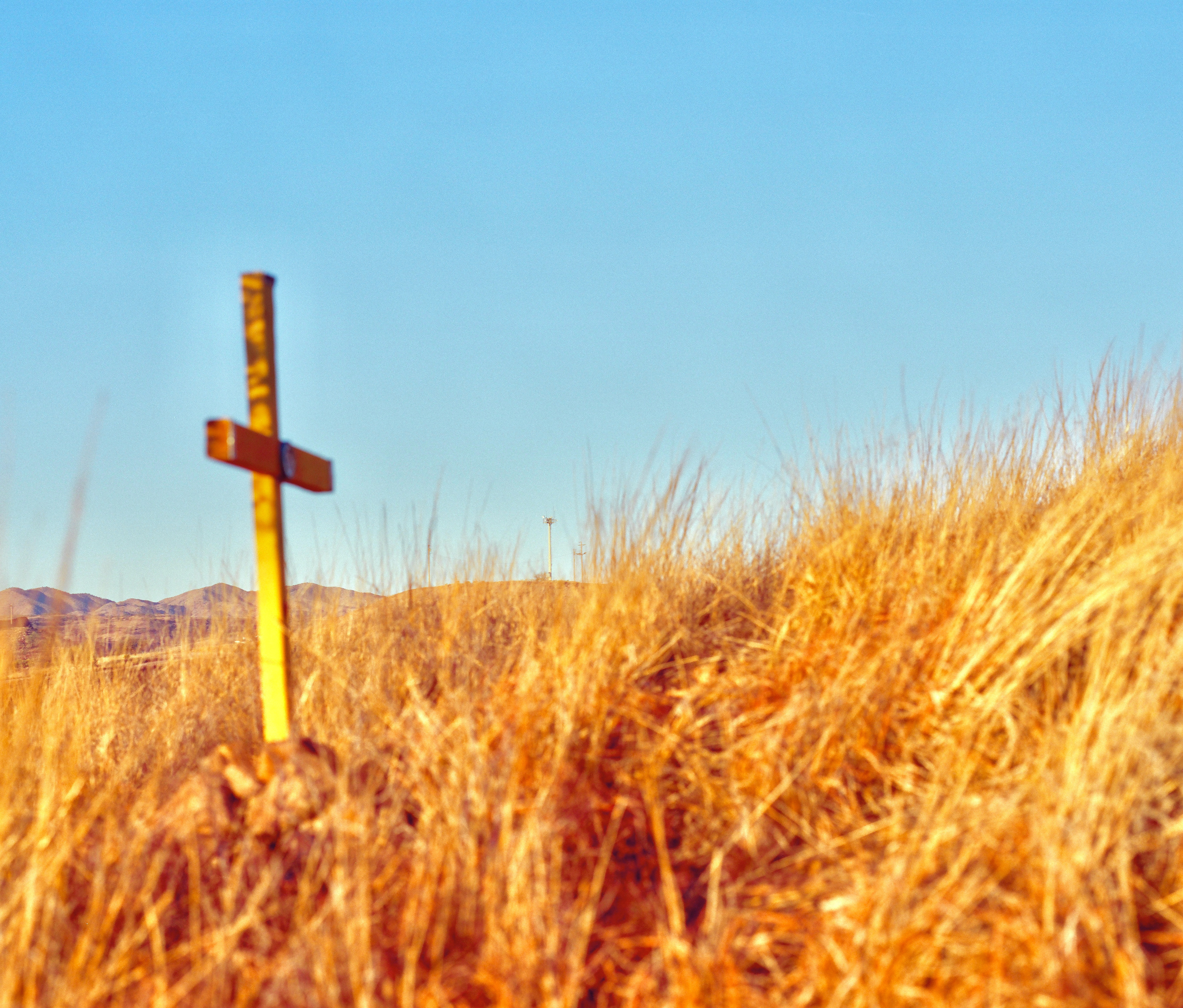 A cross marks the location where the body of Javier Mendoza was discovered. Cause of death: exposure to the elements