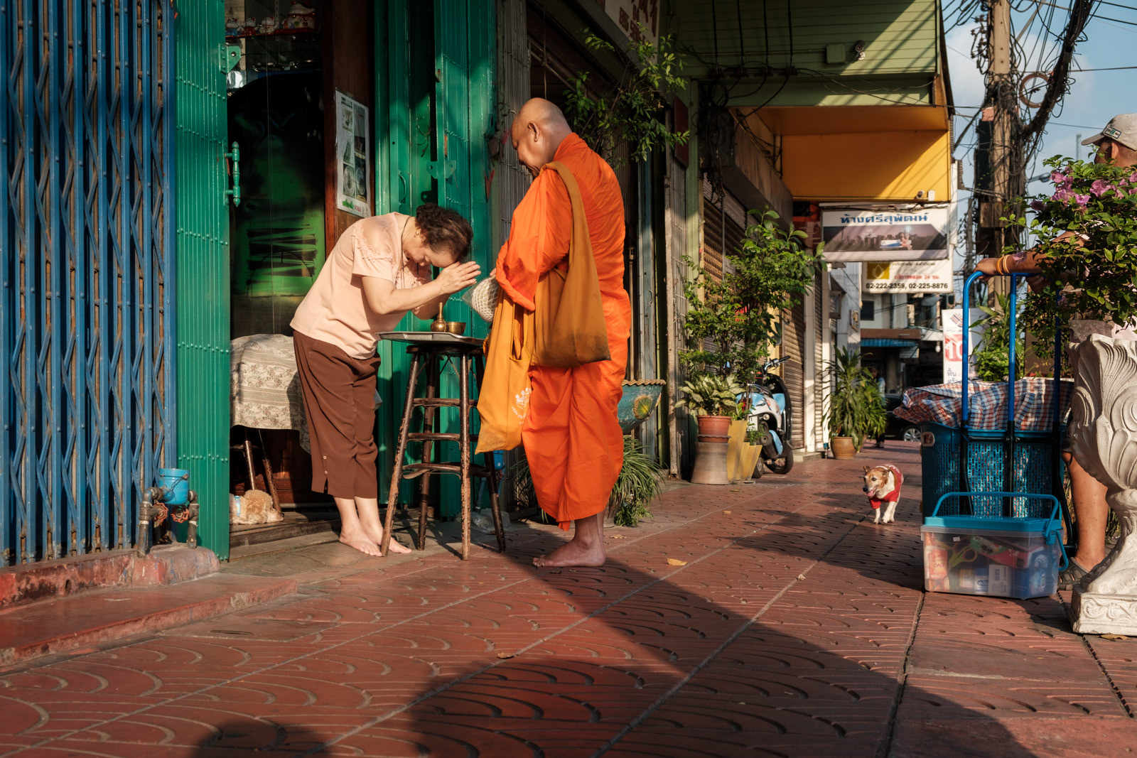 Monk on his morning alms round.