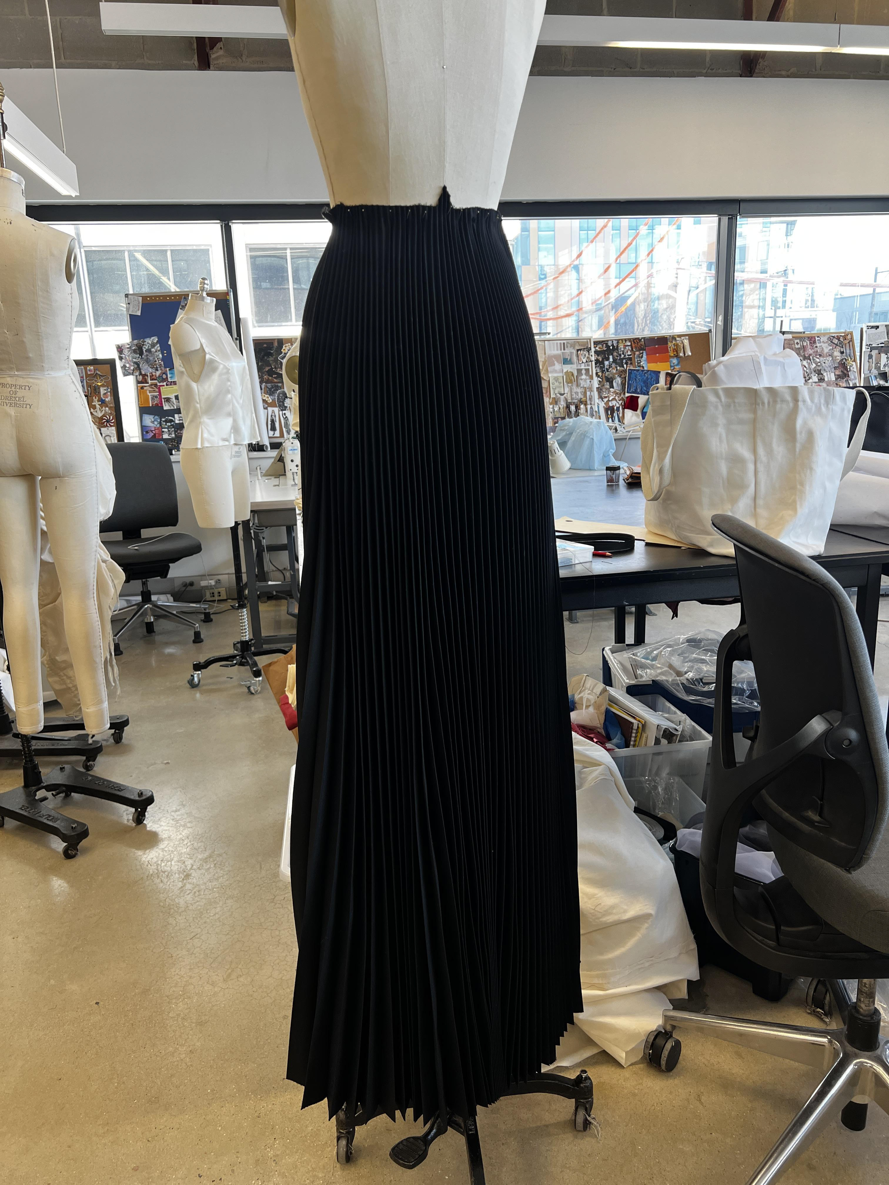 Hanging pleats overnight to stretch the bias