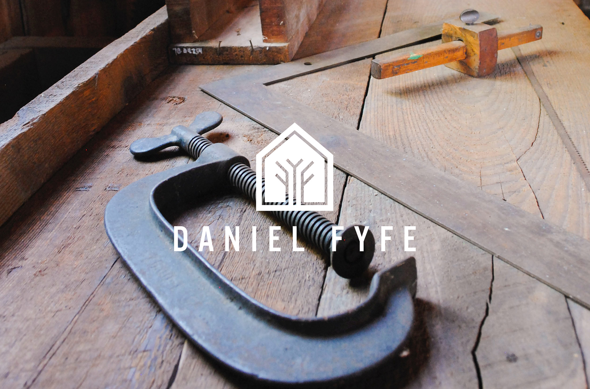 Daniel Fyfe Bespoke Carpentry white logo design