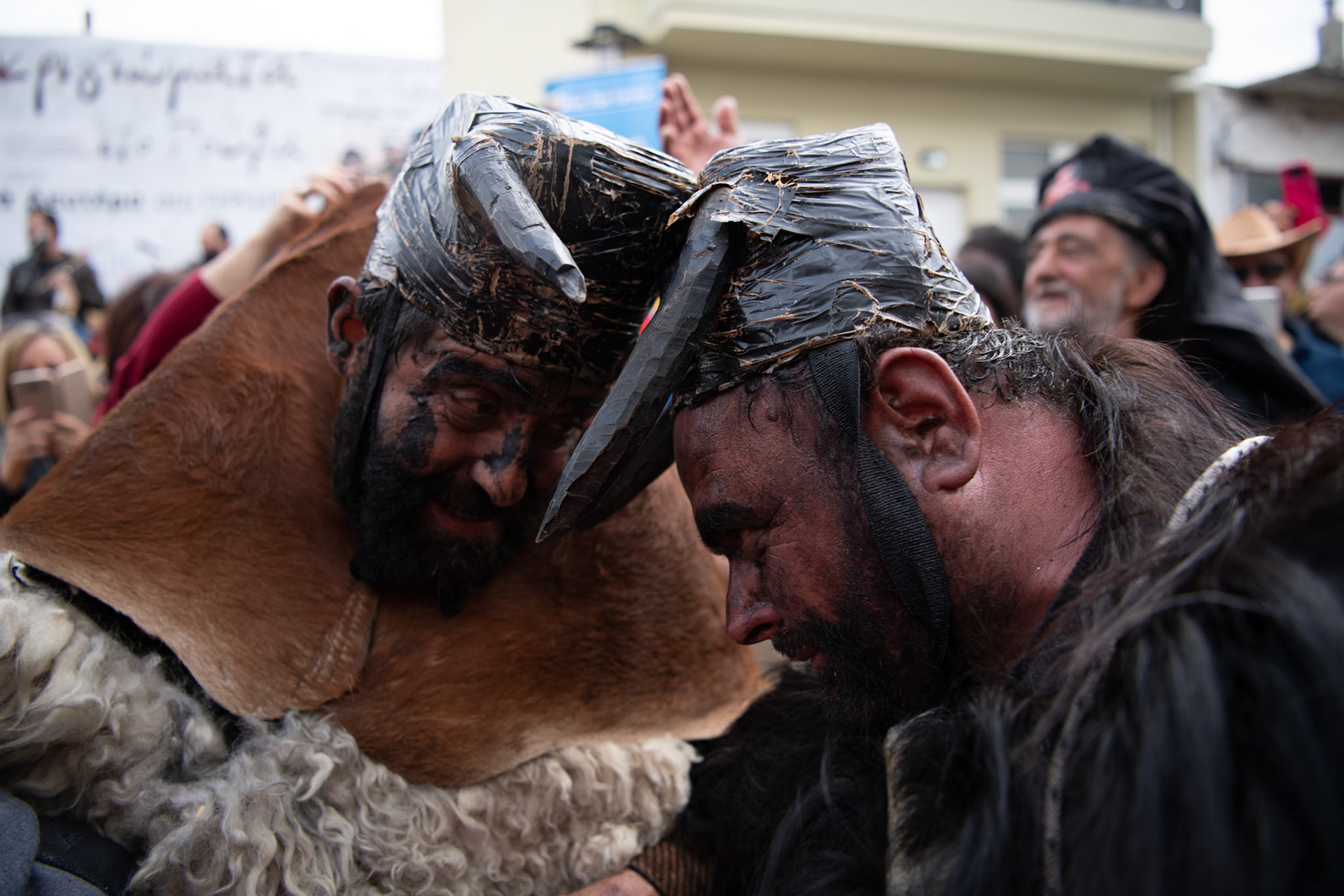 Two men dressed as oxen “clash” with each other , at the festivities of Clean Monday, in the village of Yeryeri, Crete, Greece, Monday, Feb. 27, 2017.