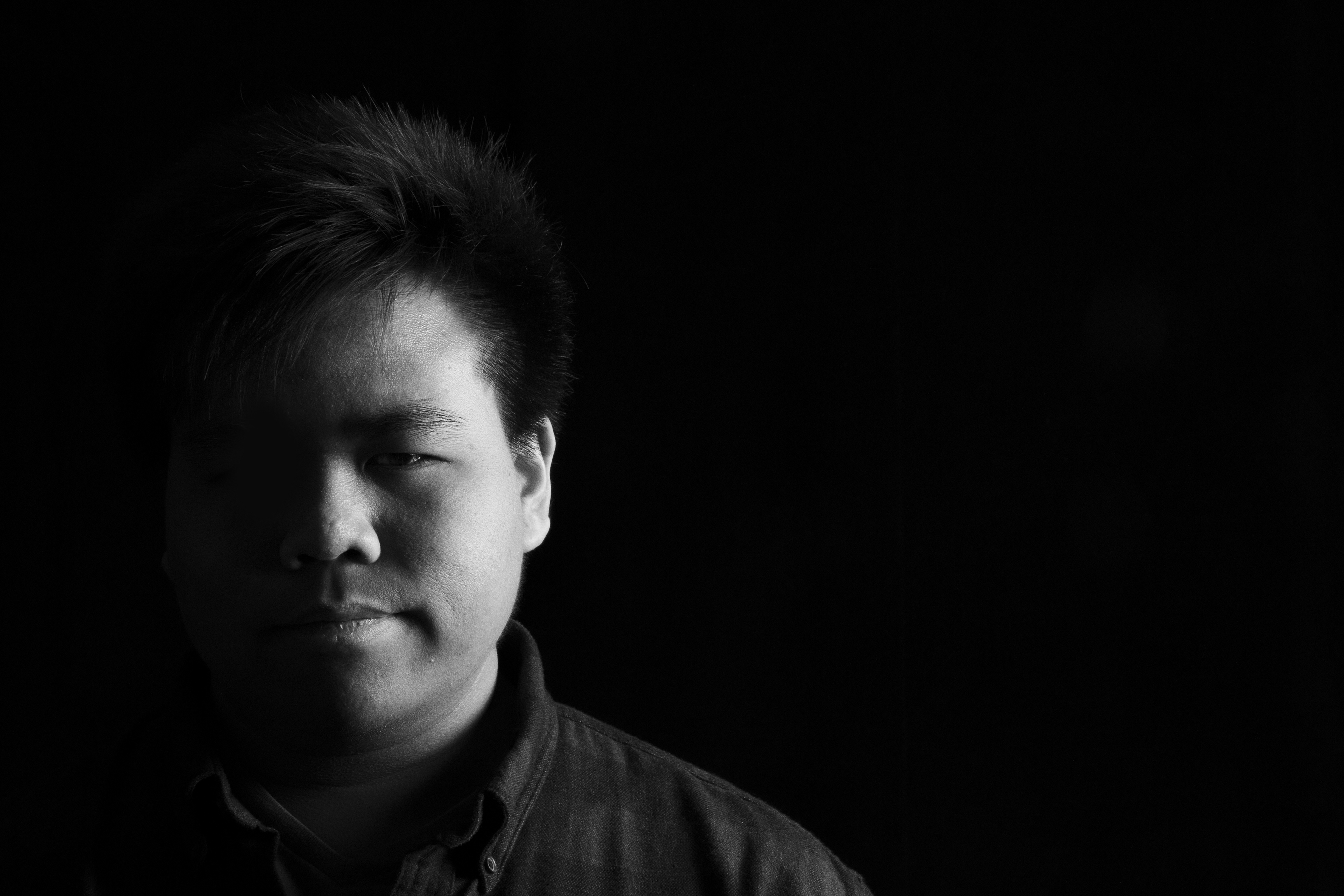 Black and white portrait using split lighting