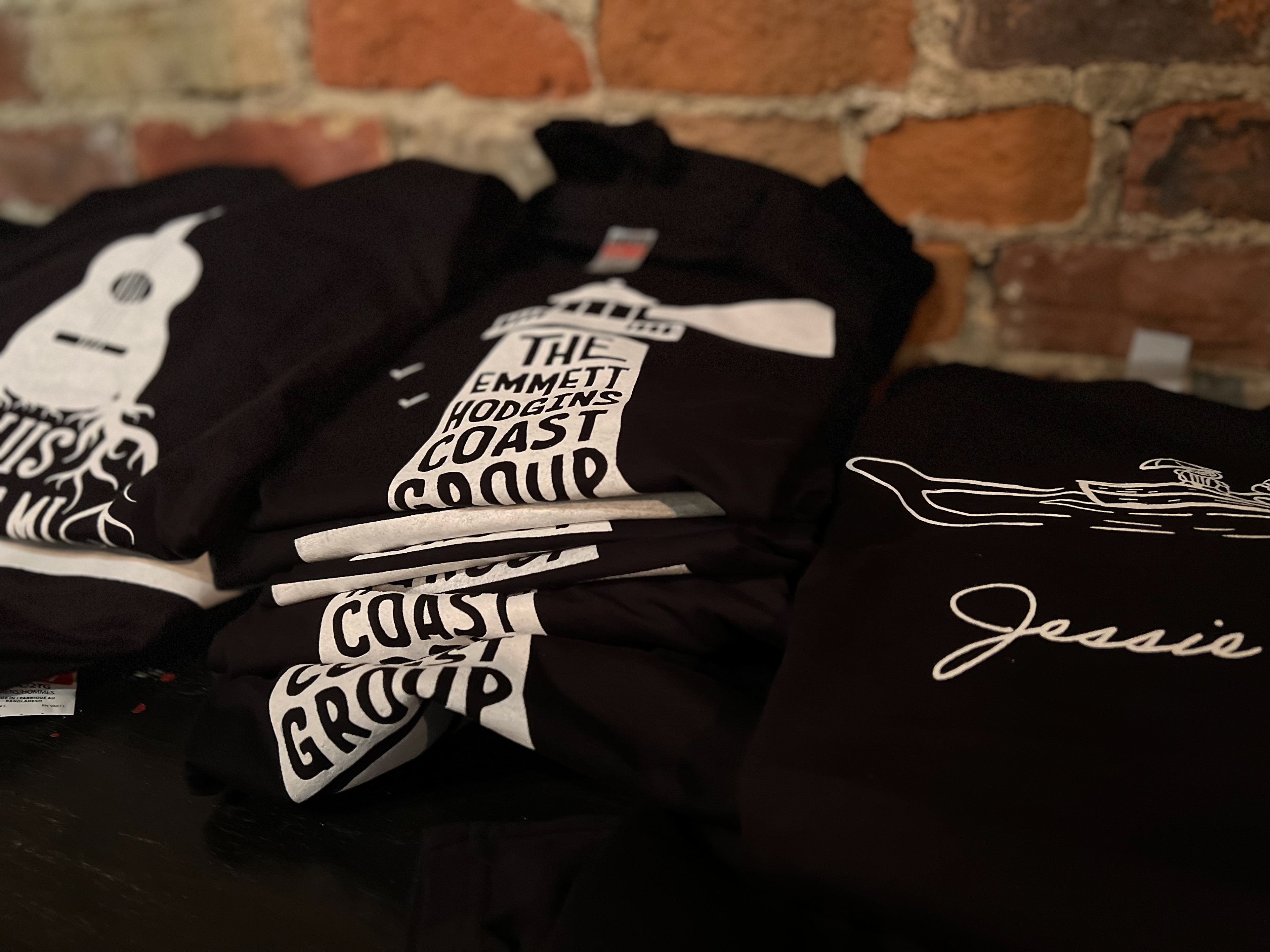 Luis Anselmi, The Emmett Hodgins Coast Group and Jessie Gosling shirt designs printed