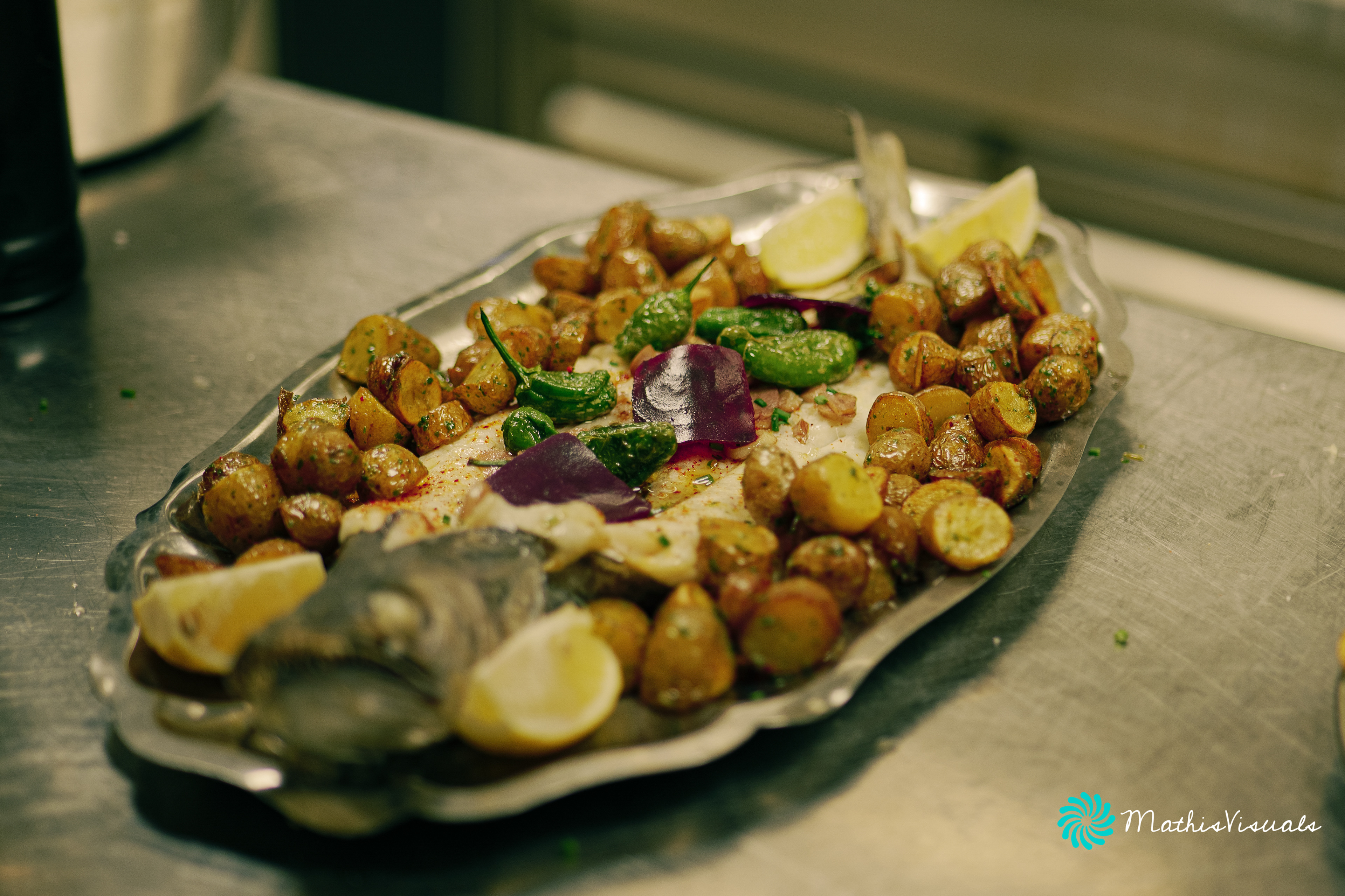 Spanish-style hake with grenailles