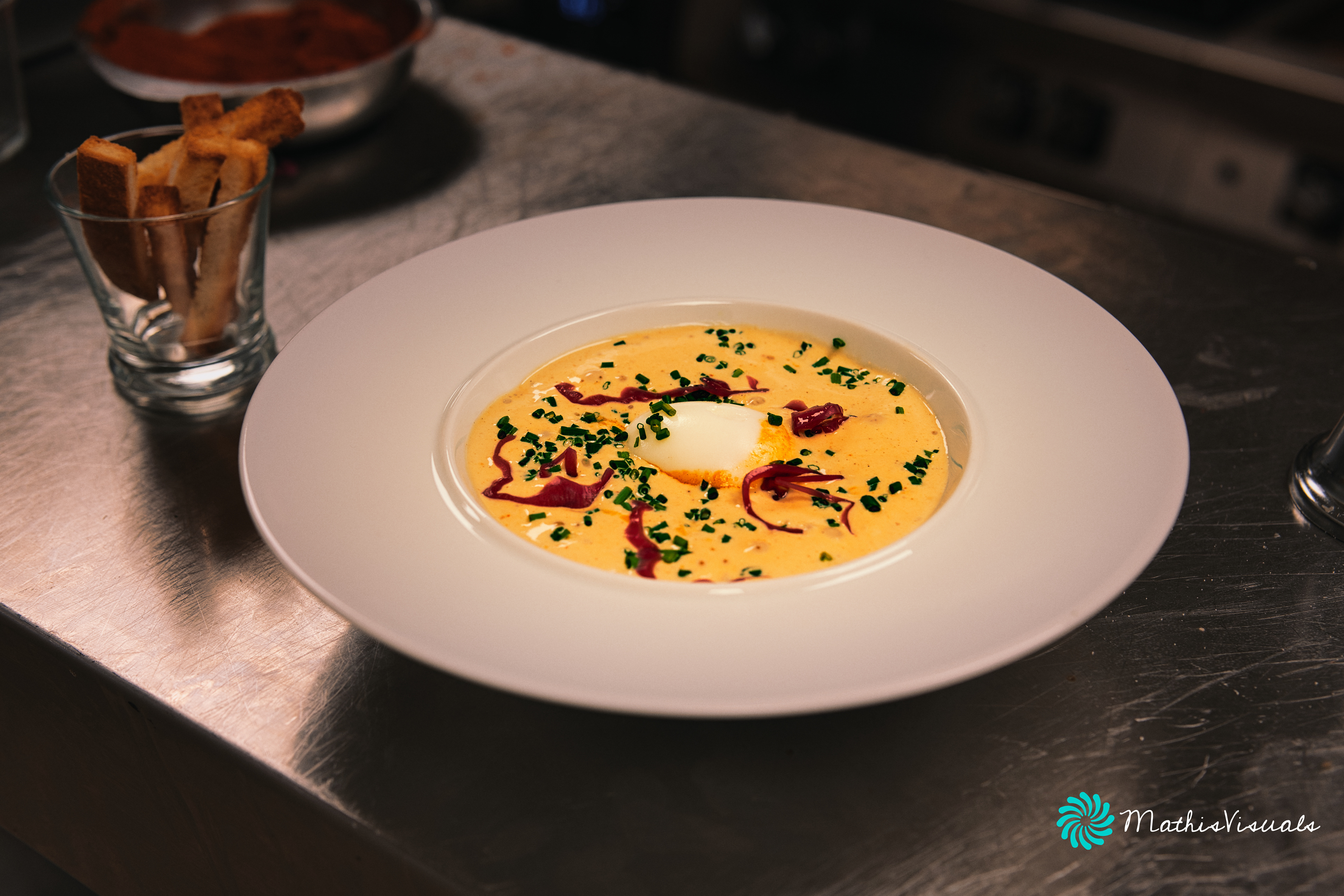 Soft-boiled egg with basquaise sauce and Iberian whipped cream
