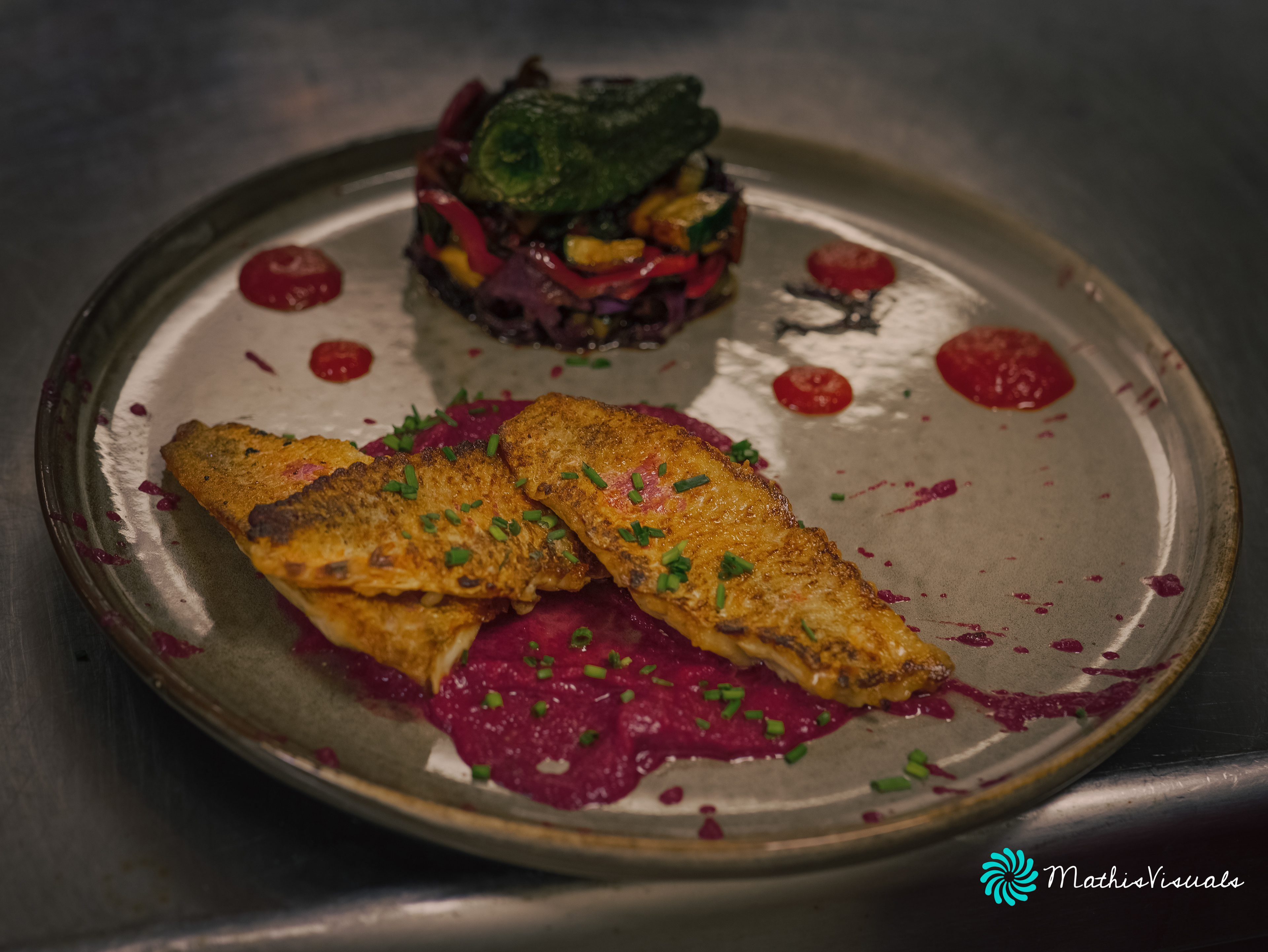 Red mullet with beet sauce and preserved vegetables