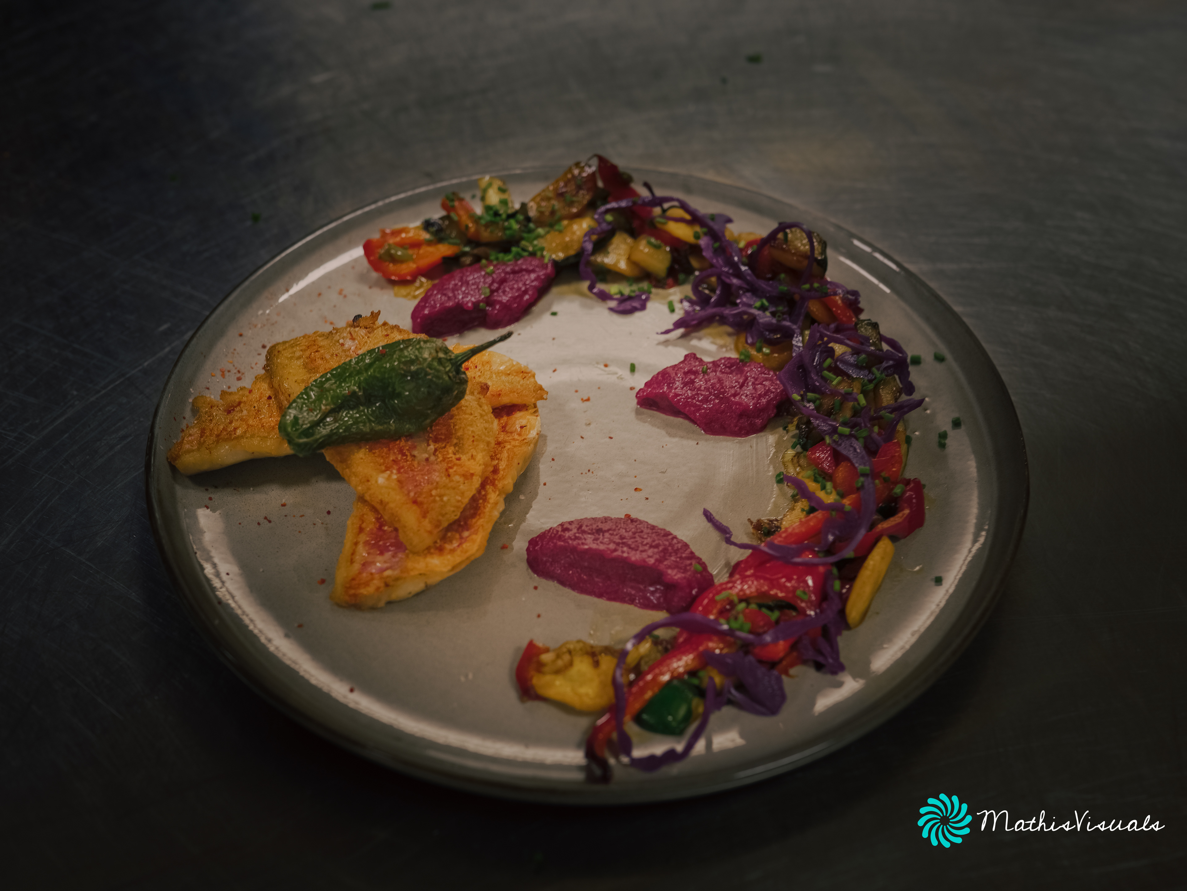 Red mullet with beet sauce and preserved vegetables