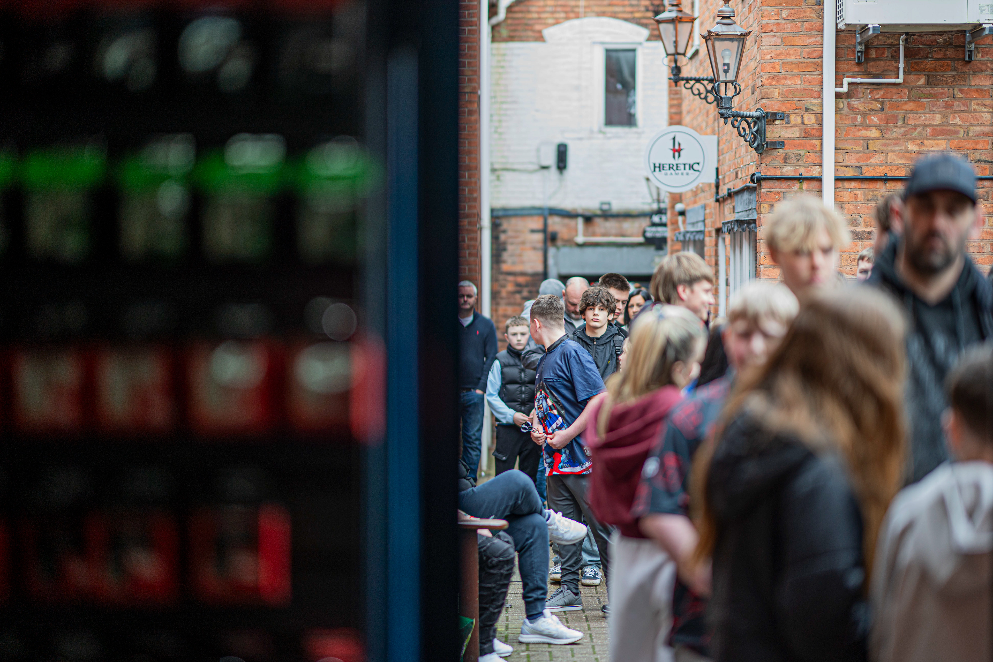 A queue of darts fans waiting for PDC pro Daryl Gurney to arrive at Midlands Darts Shop, Tamworth, Staffordshire. 1st March 2026