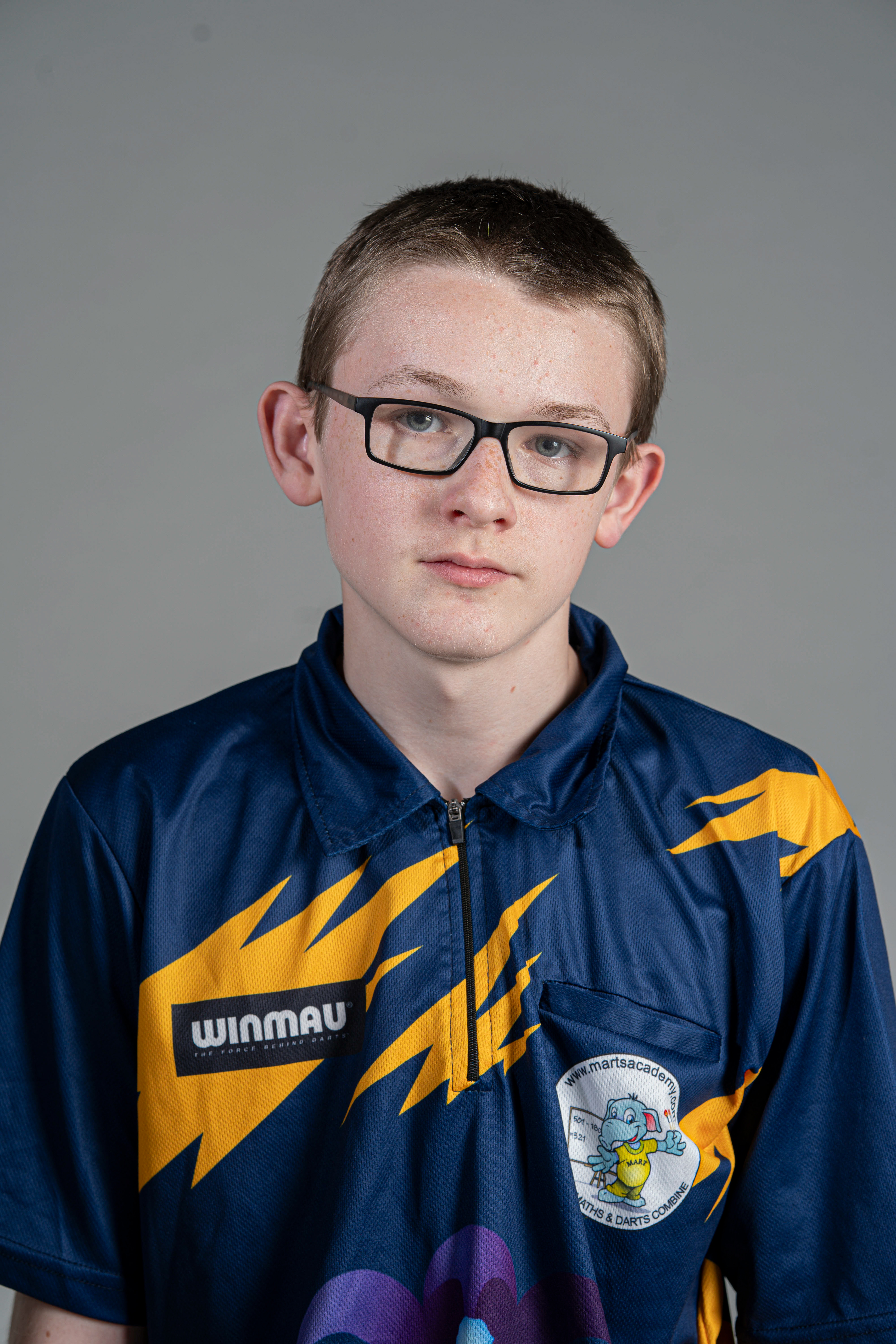 15-year-old darting wonderkid, Jack Nankervis, wearing his most recent playing shirt made by Winmau in Studio 3 at Falmouth University. 14th April 2026