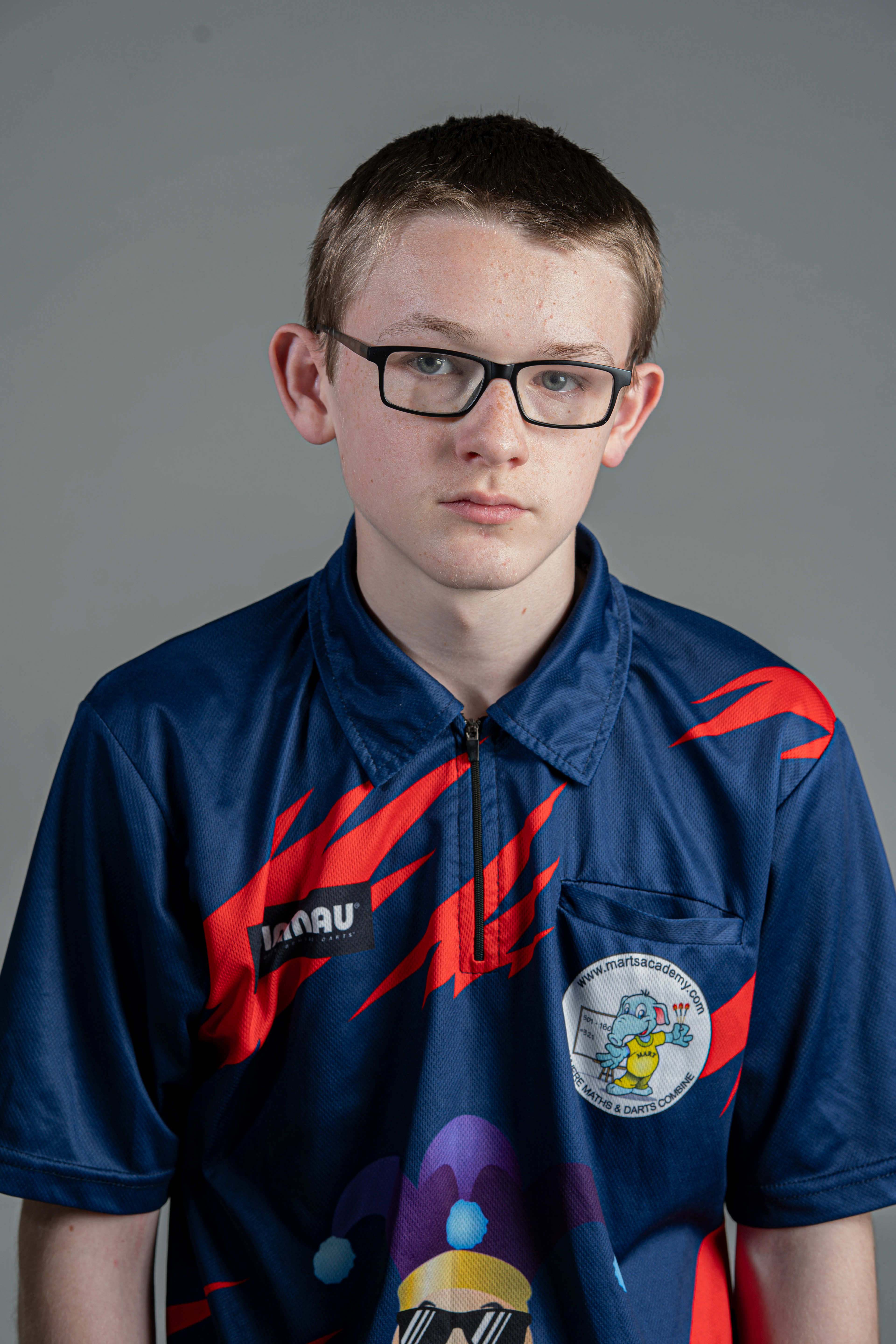 15-year-old darting wonderkid, Jack Nankervis, wearing his previous playing shirt made by Winmau in Studio 3 at Falmouth University. 14th April 2026 15-year-old darting wonderki