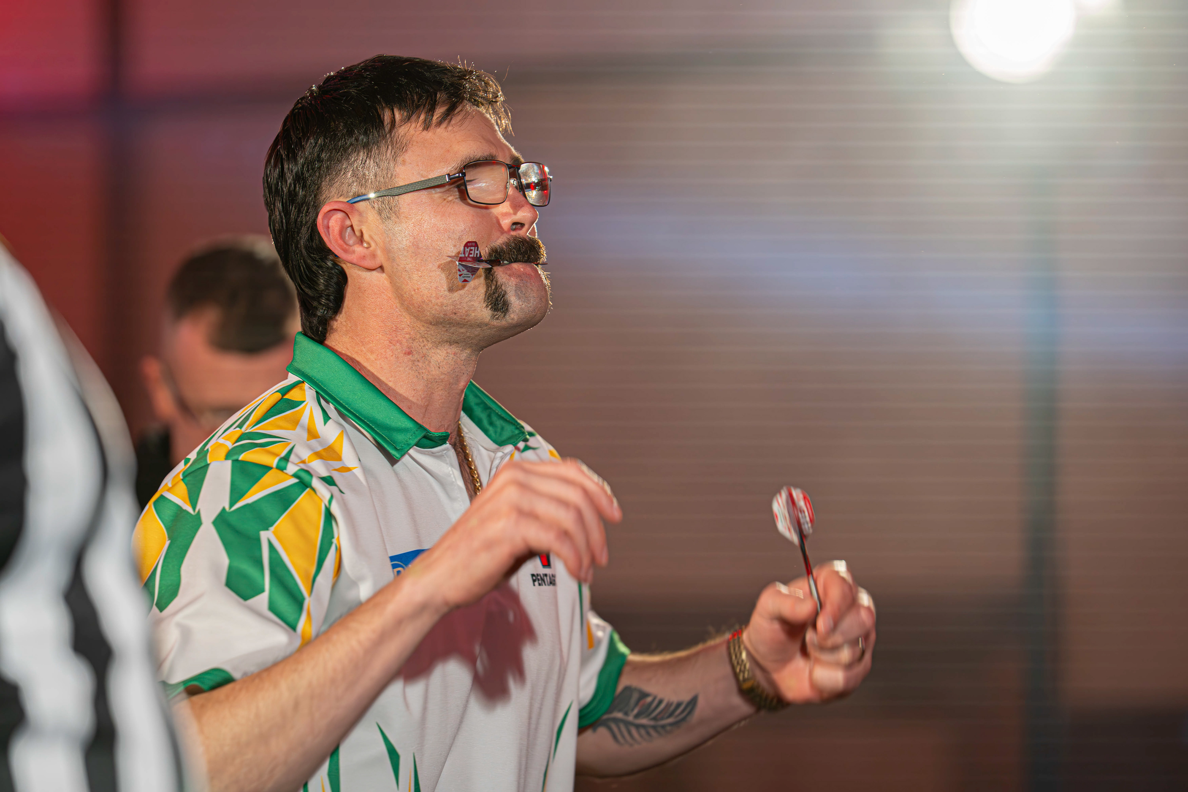Damon Heta blowing darts out of his mouth against Tiktok star Charlie Murphy at the Copthorne Hotel, Brierley Hill. 27/03/26