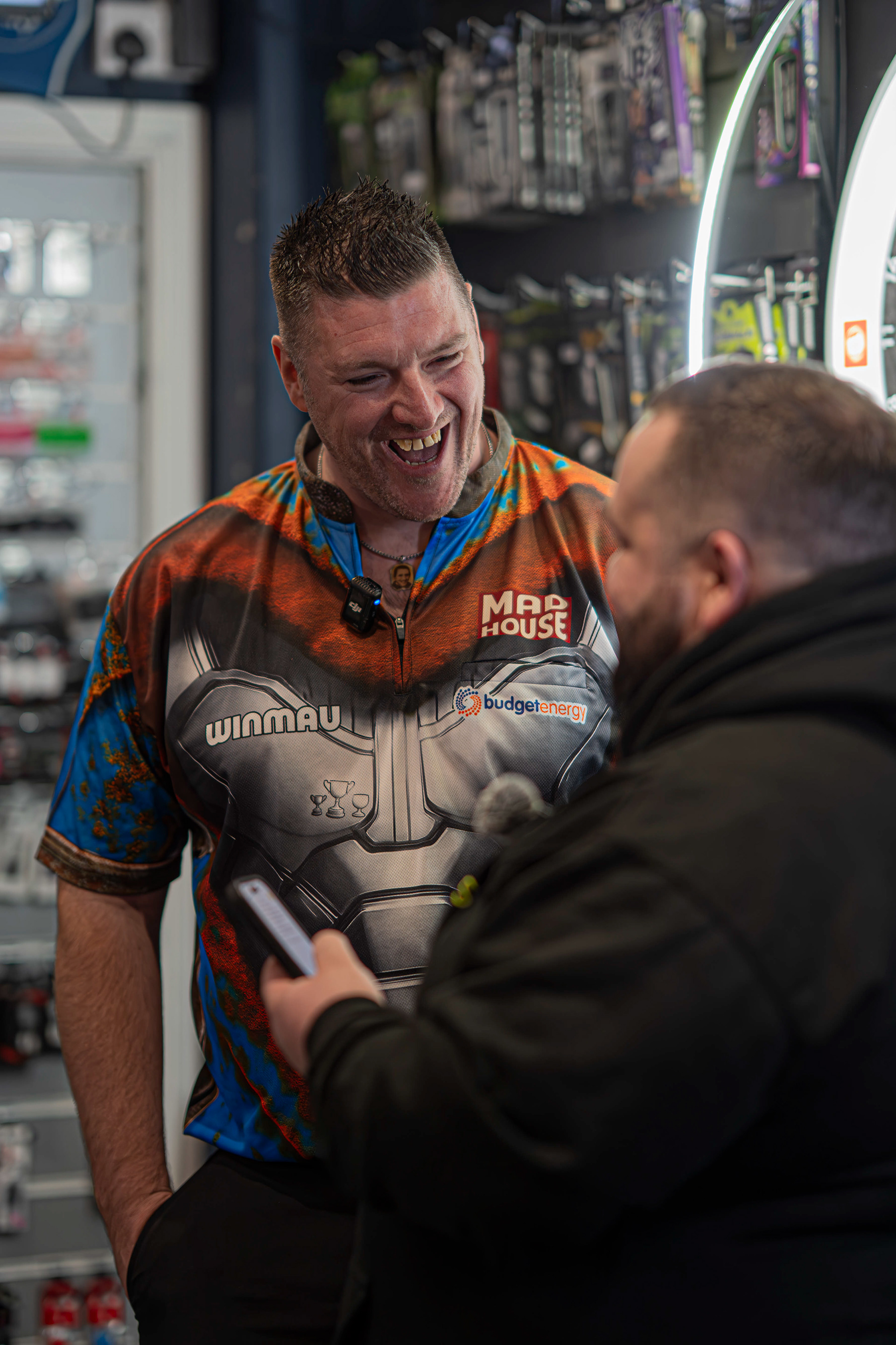 PDC pro Daryl Gurney being interviewed by Dom Mason for a TikTok video at Midlands Darts Shop, Tamworth, Staffordshire. 1st March 2026