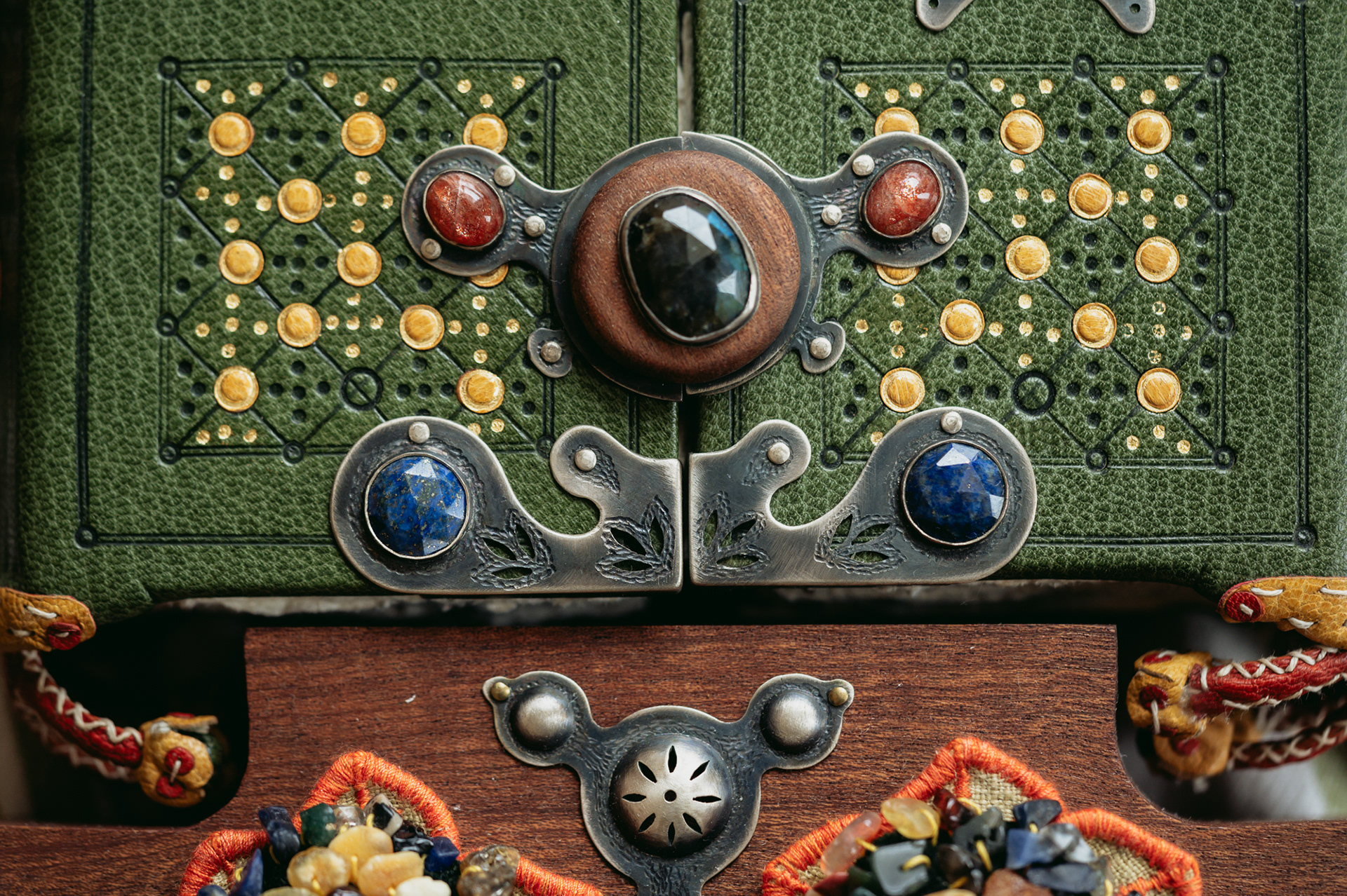 Details of a current work of Stopan – decorative elements of mahogany, silver and semi-precious stones.