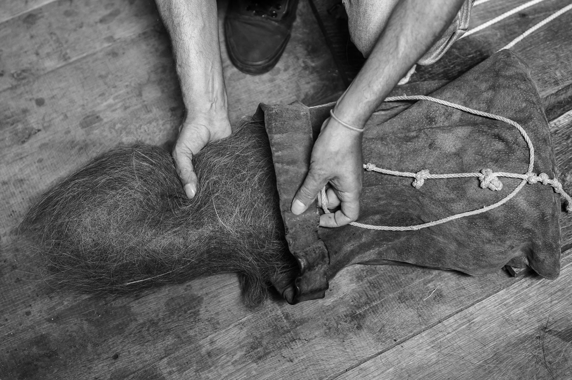 The rolled fur is placed into a “vulia” – a leather bag