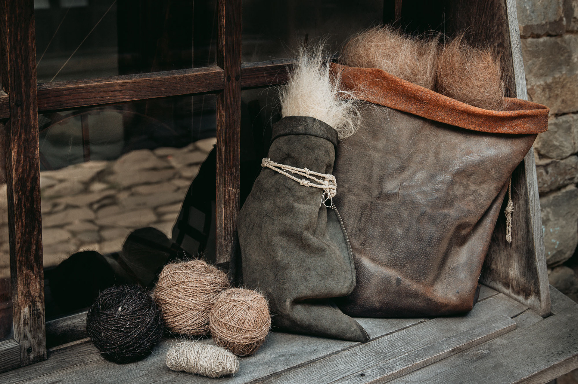 Yarn is spun from the cleaned and color-sorted fur. The end product of spinning is the balls of hair threads (also called weft), which are interwoven with the warp when woven into fabric.