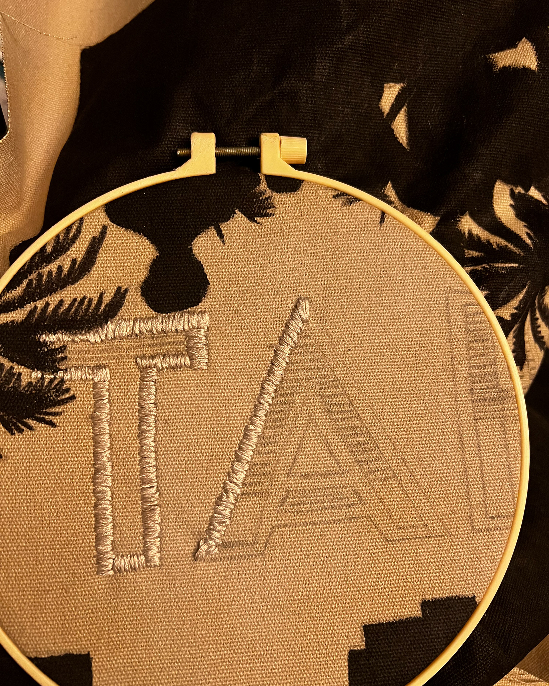 4. Embroidered word.