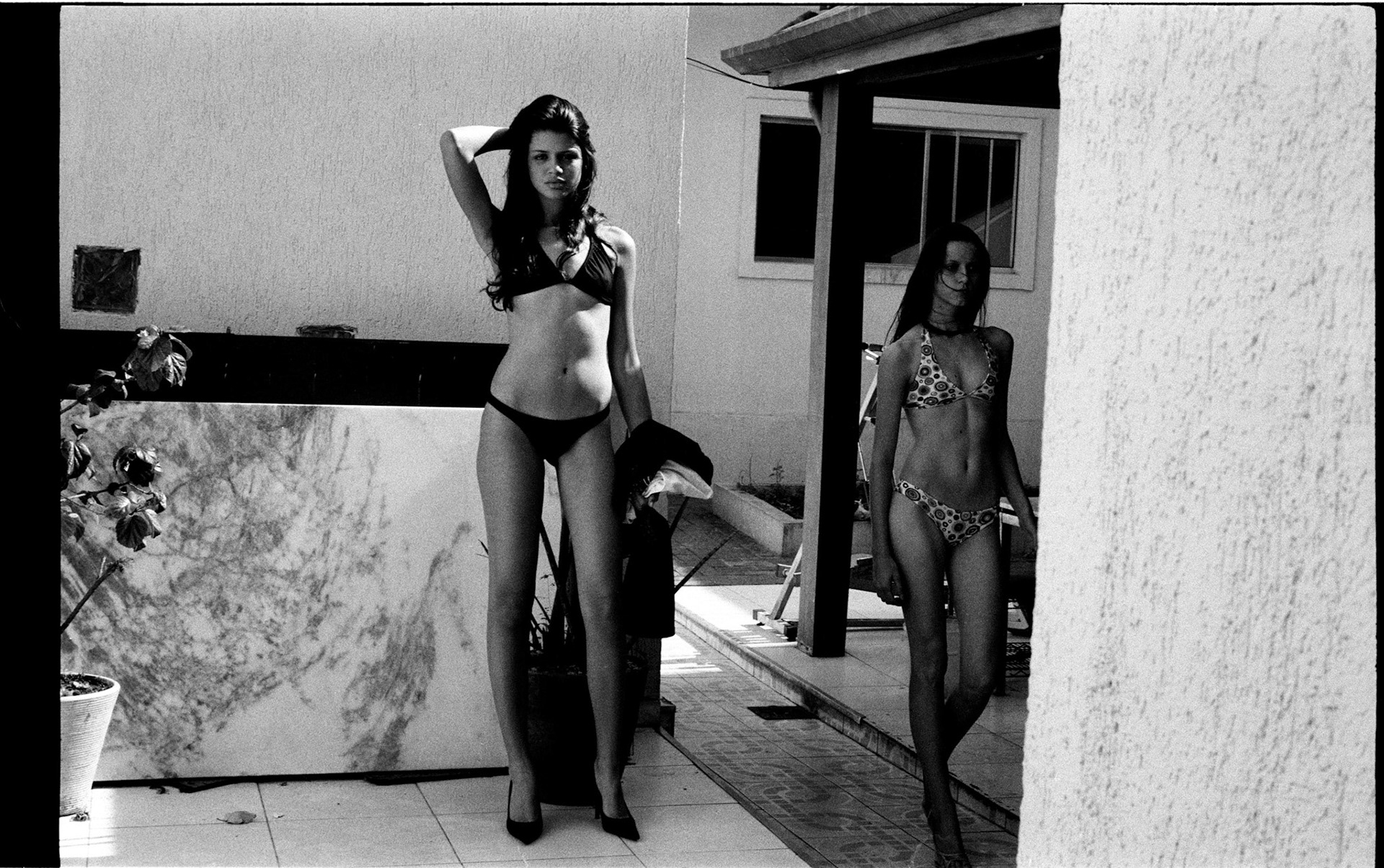 Gabriella Maïa (posing) and others are undressing prior to be filmed walking by booker Vitor who came especially from Paris in order to find new young wanabe models. They have to wear swimsuits so he can have an idea of their bodies.