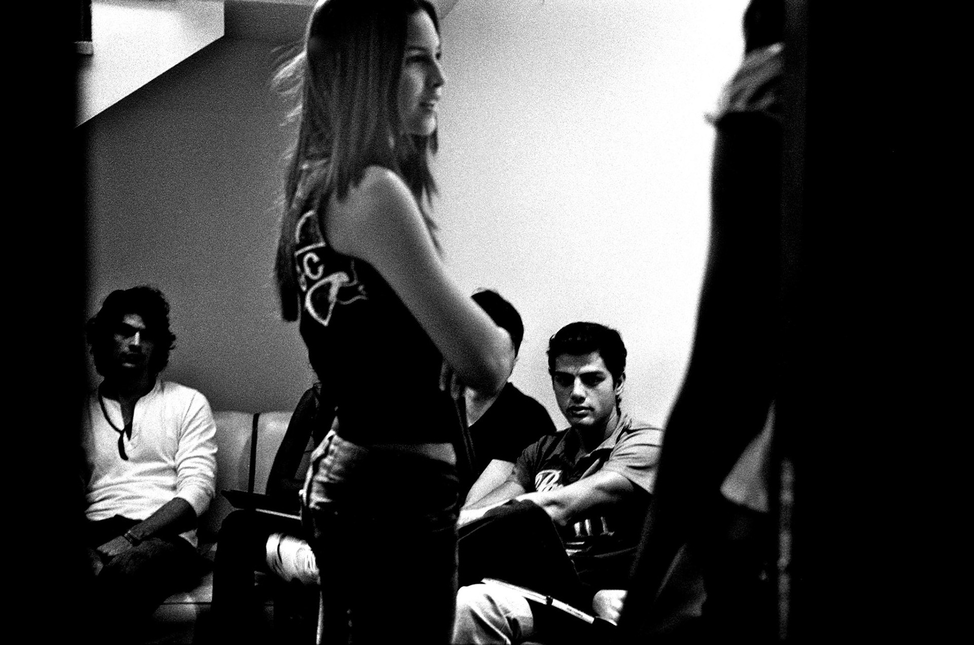 Erika Fontes is waiting for her turn among the others, she's 15 and she travelled 1000 miles accross Brasil with her parents to go to that casting, to meet Vitor at Ming's agency.