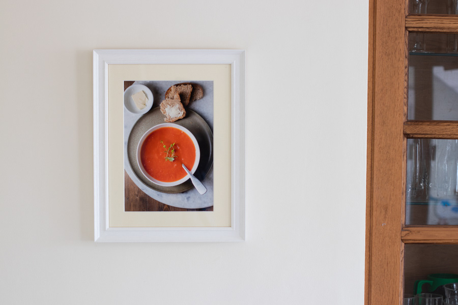 Roasted pepper and tomato soup printed on fine art paper in white wooden frame