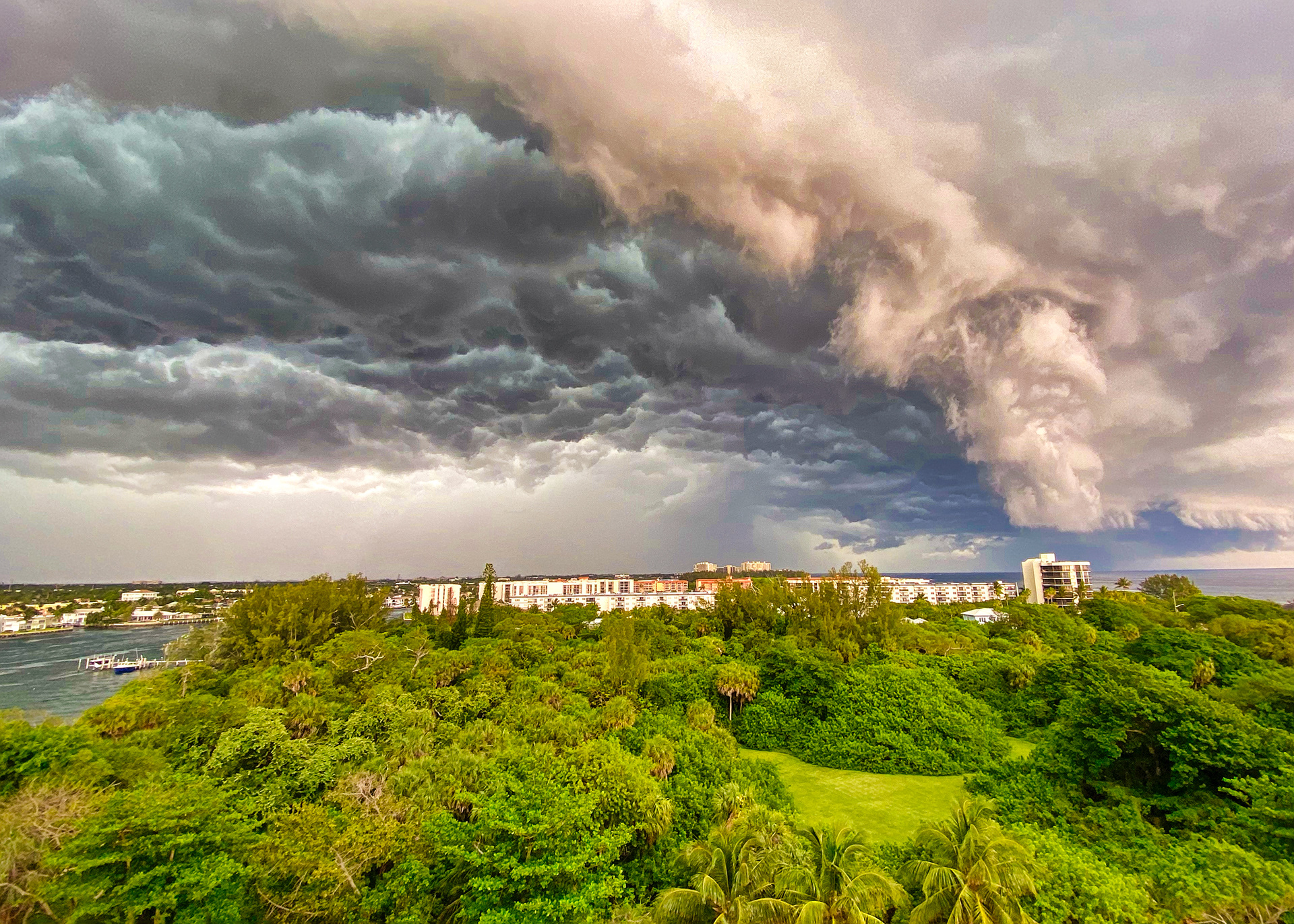 A rapidly developing severe thunderstorm appeared over South Florida this afternoon. Pack with water and .75 inch hail pounded the area. Quite a serious display of nature..